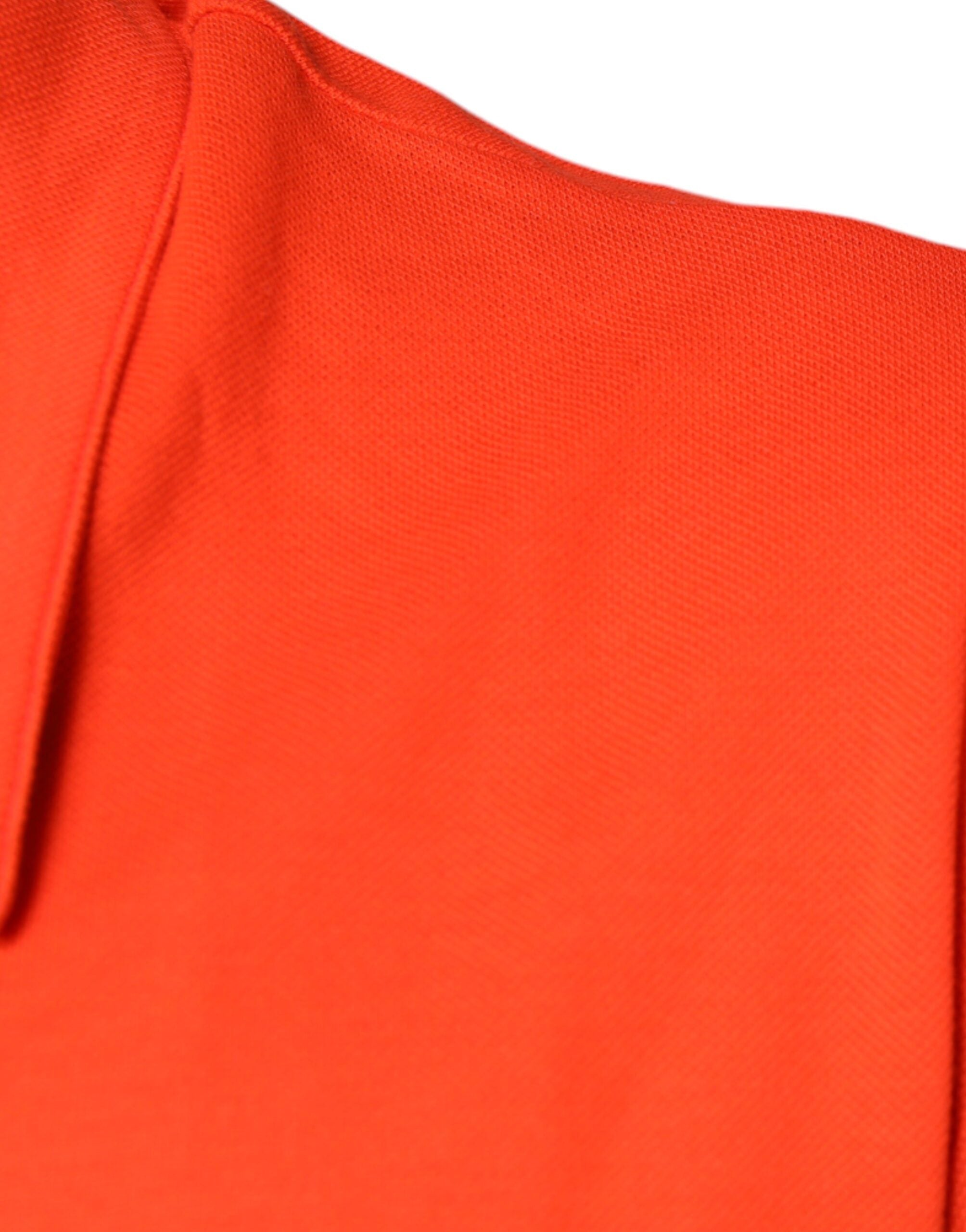 Chemise polo décontractée en coton orange de Dolce & Gabbana avec boutons, style casual et élégant.