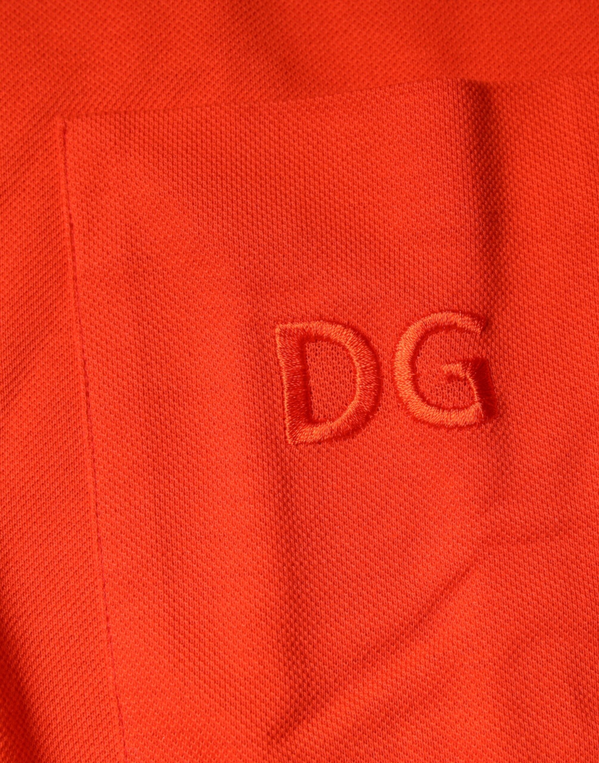 Chemise polo décontractée en coton orange de Dolce & Gabbana, boutonnière sur le devant, style casual élégant.