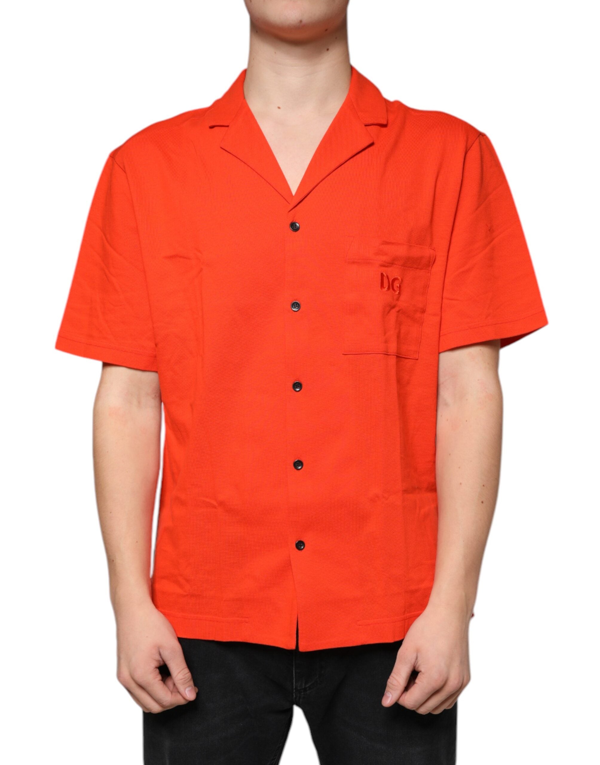 Chemise polo décontractée en coton orange de Dolce & Gabbana avec boutons, vue de face sur le produit.