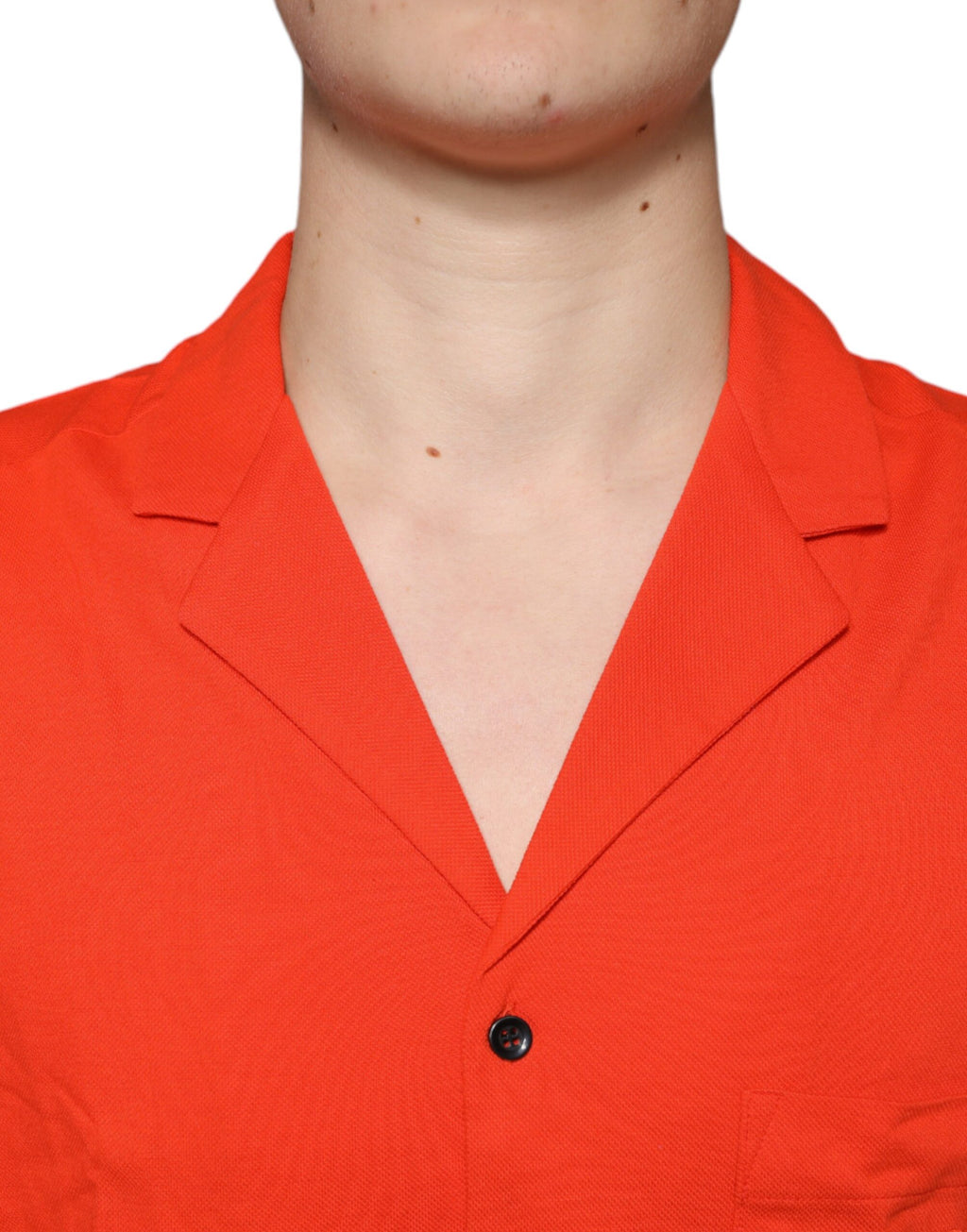 Chemise polo décontractée en coton orange de Dolce & Gabbana, boutonnière classique, style élégant et casual.