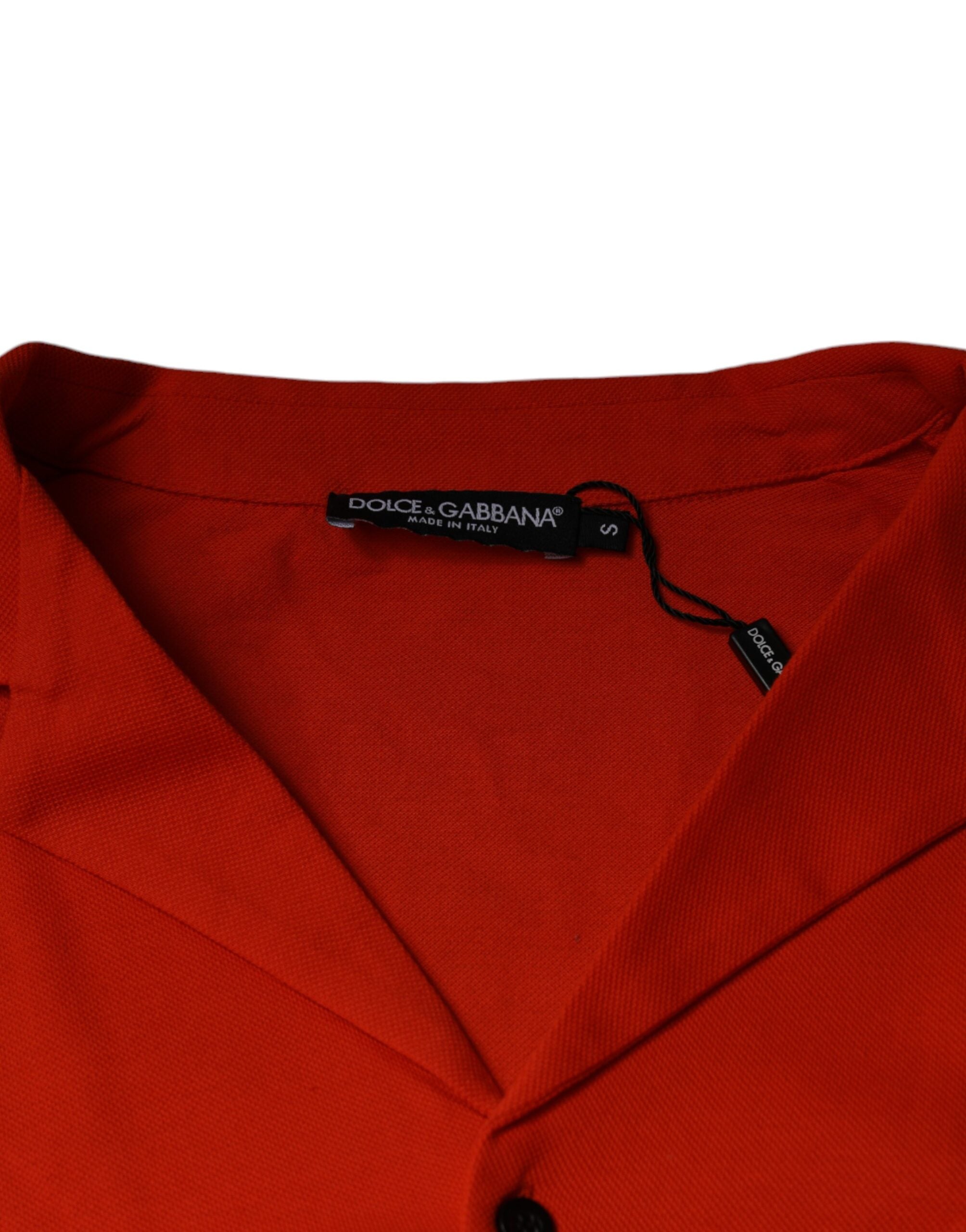 Chemise polo décontractée en coton orange de Dolce & Gabbana, boutonnière, style casual et élégant.