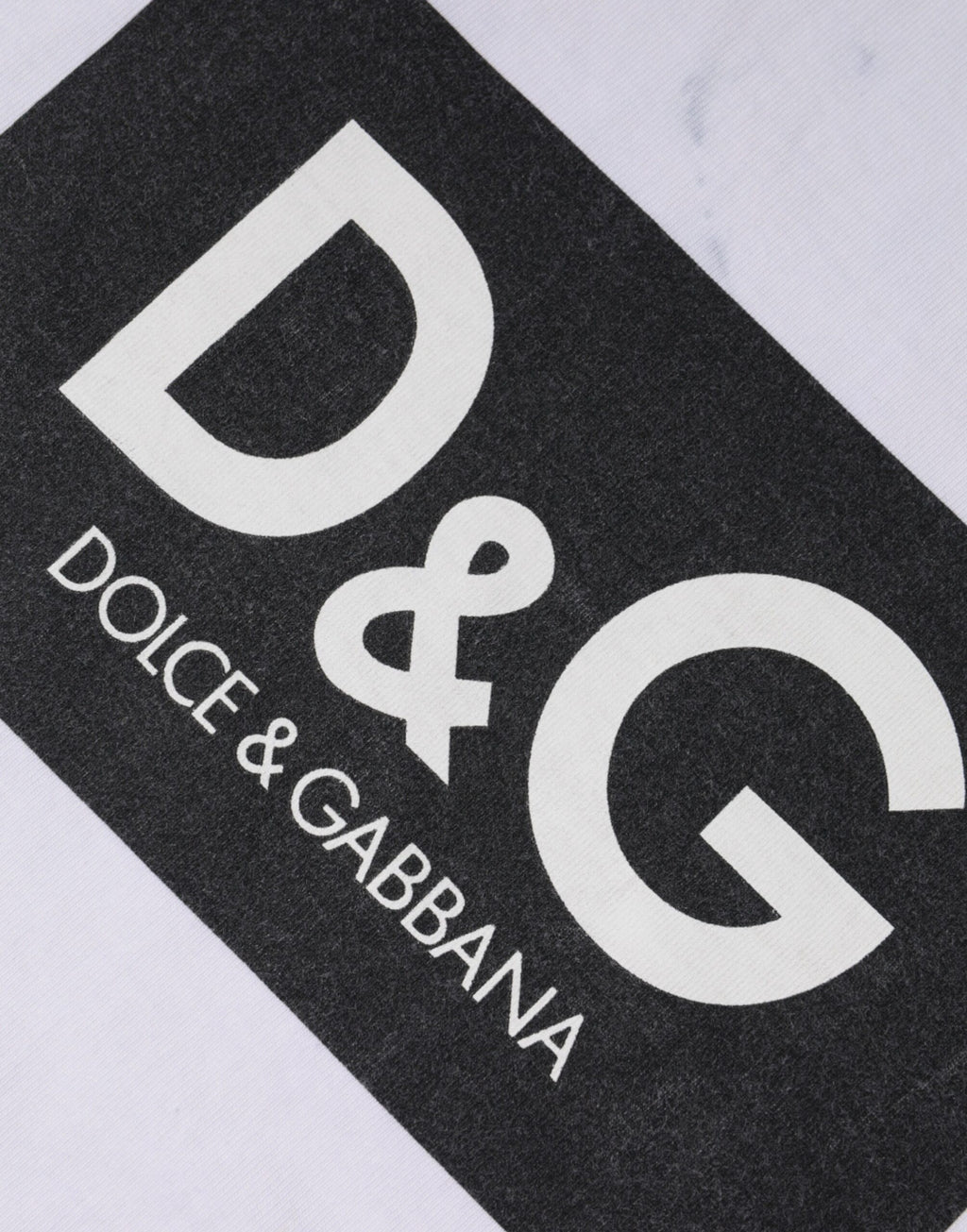 T-shirt blanc en coton Dolce & Gabbana avec logo imprimé, col rond, vue de face.