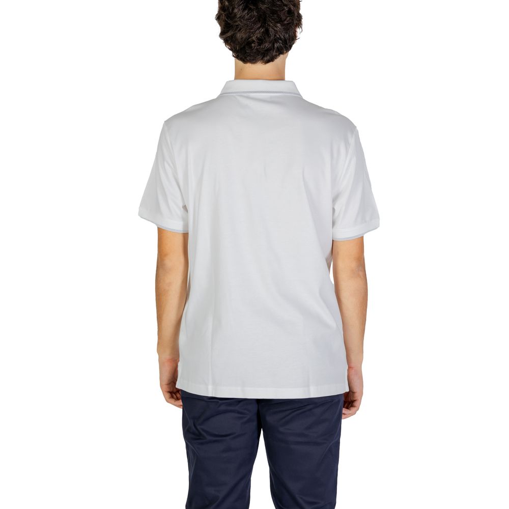 Chemise polo en coton blanc de Calvin Klein Jeans, vue de face, avec col classique et logo discret.