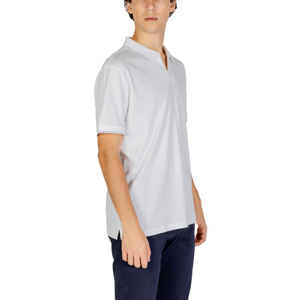 Chemise polo en coton blanc de Calvin Klein Jeans, vue de face, avec col et boutons, adaptée pour un look décontracté.