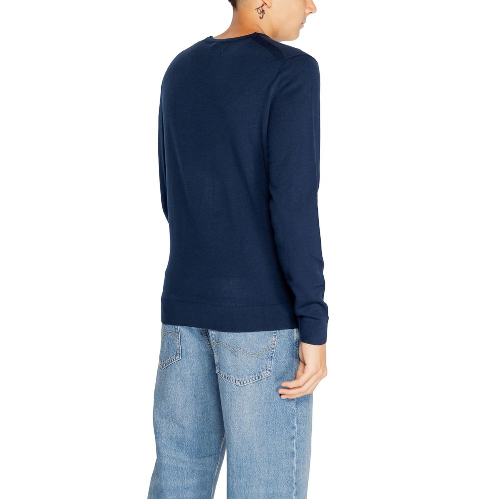 Sweat-shirt Calvin Klein en laine recyclée bleu, mode décontractée, détail col rond et manches longues visible sur l'image.