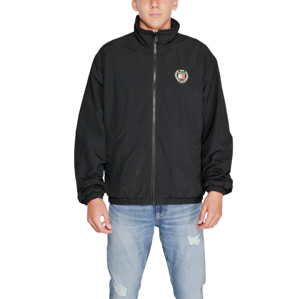 Veste Tommy Hilfiger Jeans en polyester recyclé noire avec coupe classique, visible avec détails de couture et fermeture éclair.