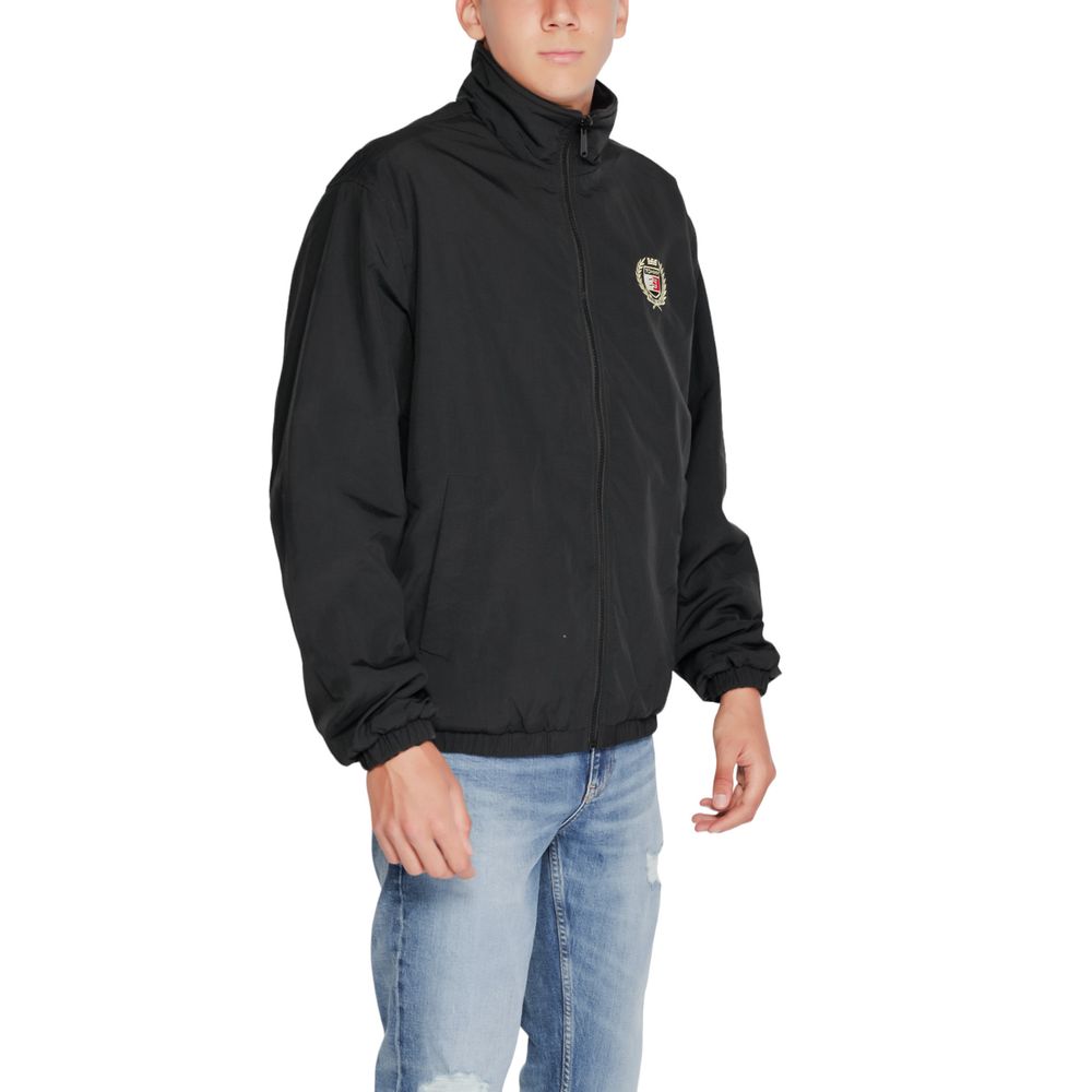Veste Shell en polyester recyclé noire Tommy Hilfiger Jeans, affichant une coupe moderne et des détails élégants.