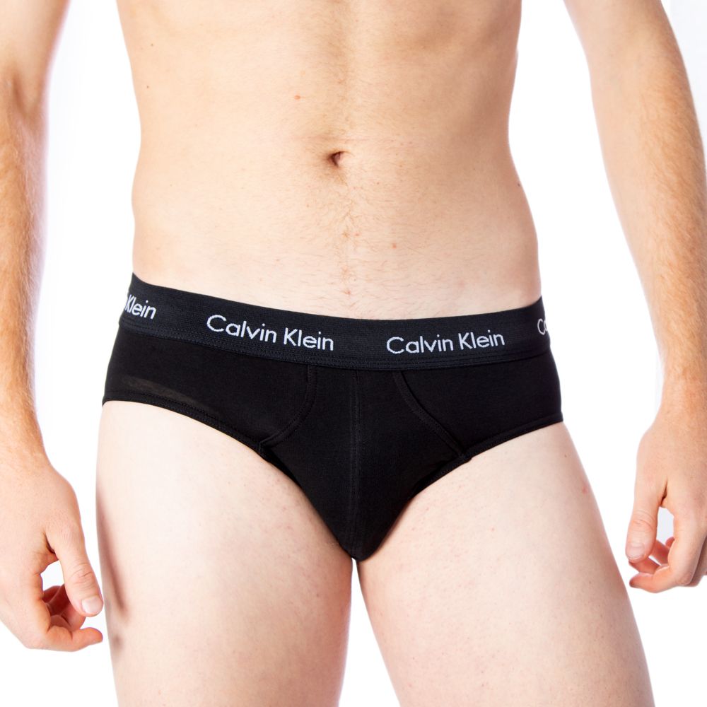 Caleçon en coton bleu de la marque Calvin Klein Underwear, ajusté et confortable, visible sur l'image.