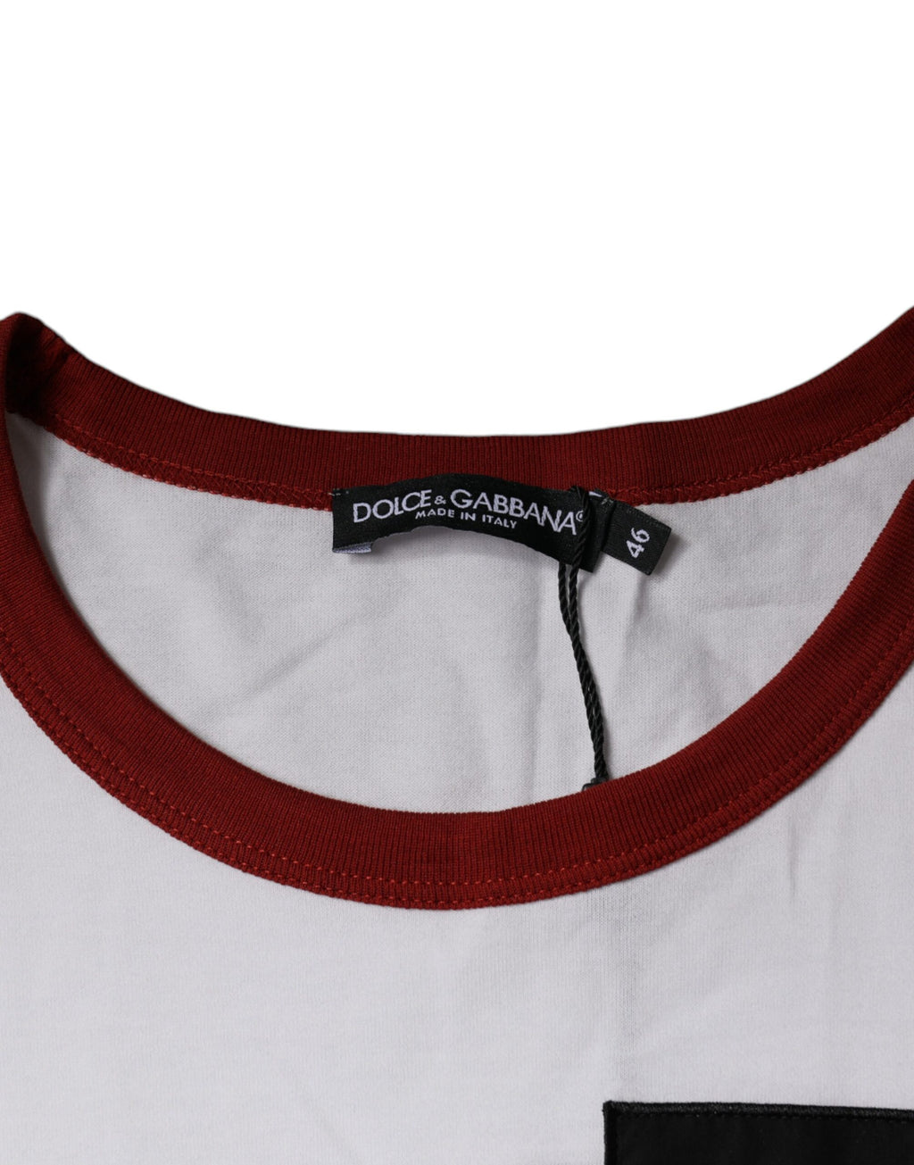 T-shirt blanc en coton Dolce & Gabbana avec motif graphique, col ras du cou et design tendance visible sur l'image.