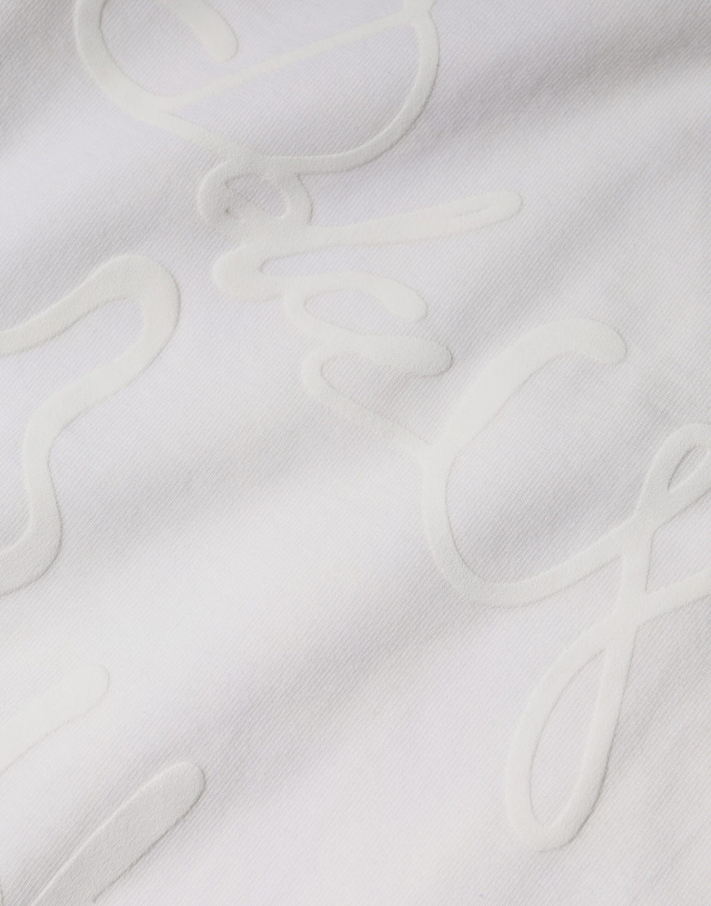 T-shirt blanc en coton Dolce & Gabbana avec logo imprimé, col ras du cou, vue de face.