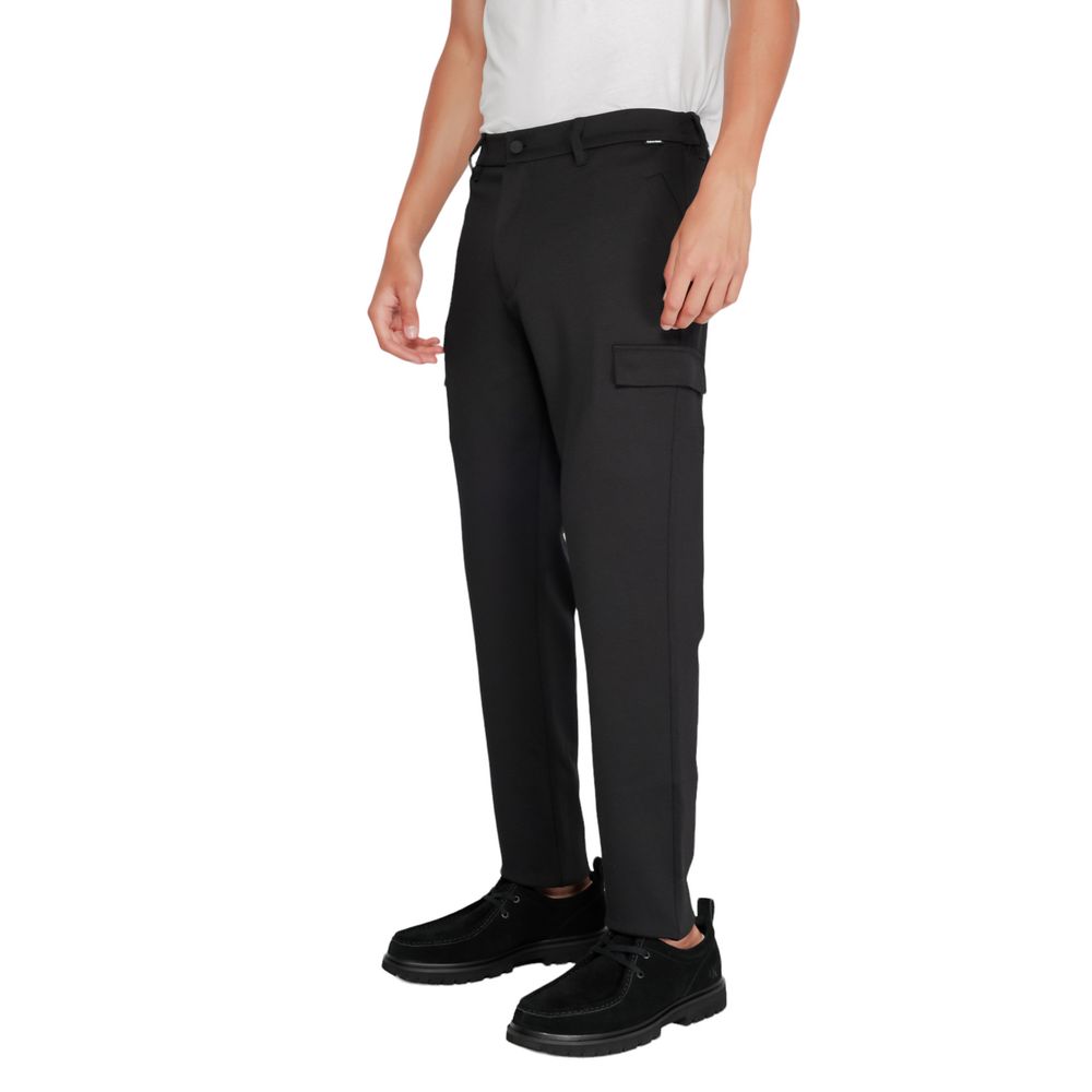 Pantalons de survêtement Calvin Klein en polyester recyclé noir, coupe décontractée, pour le sport et le confort.