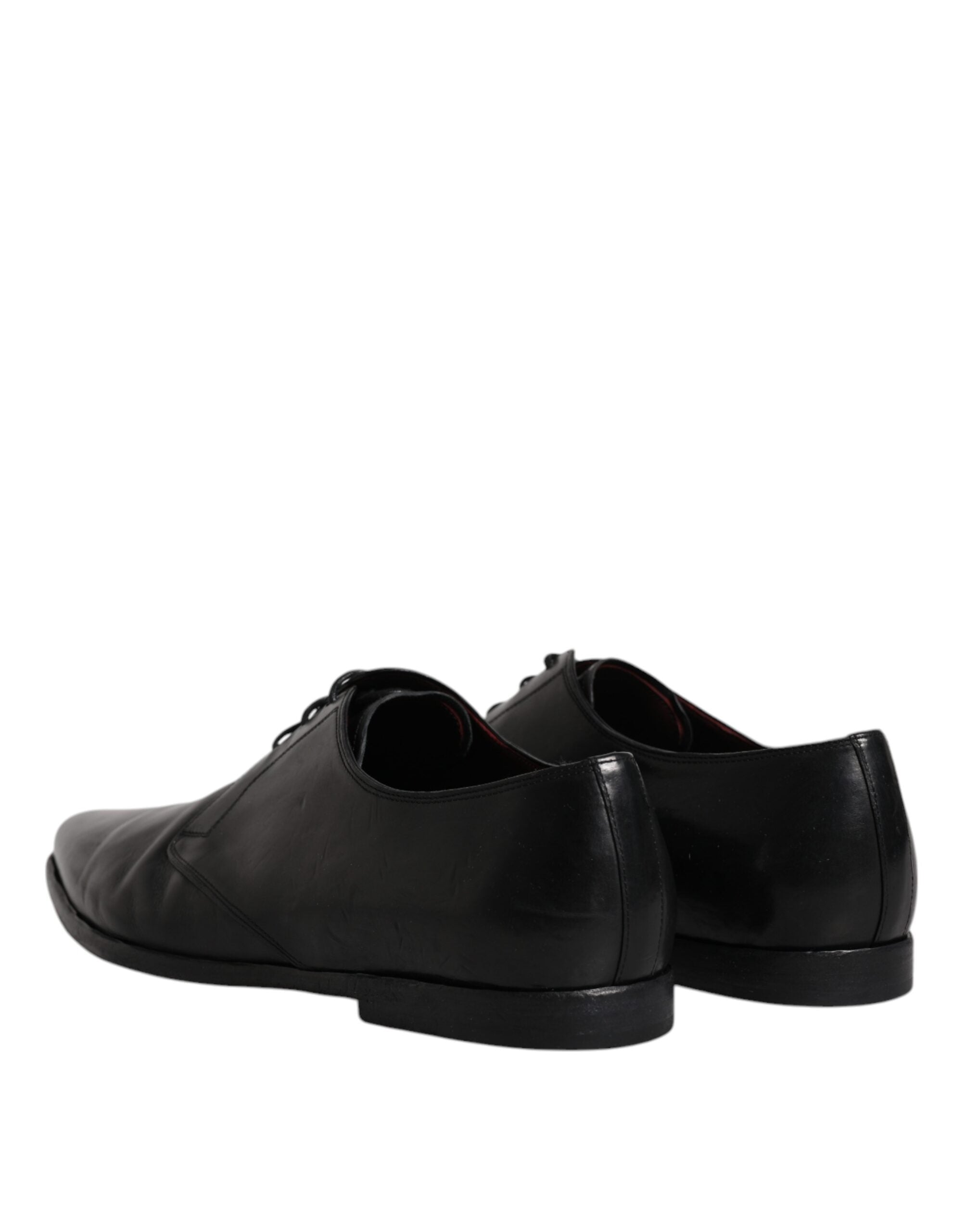 Chaussures derby noires en cuir pour homme de Dolce & Gabbana avec lacets, style formel et élégant.