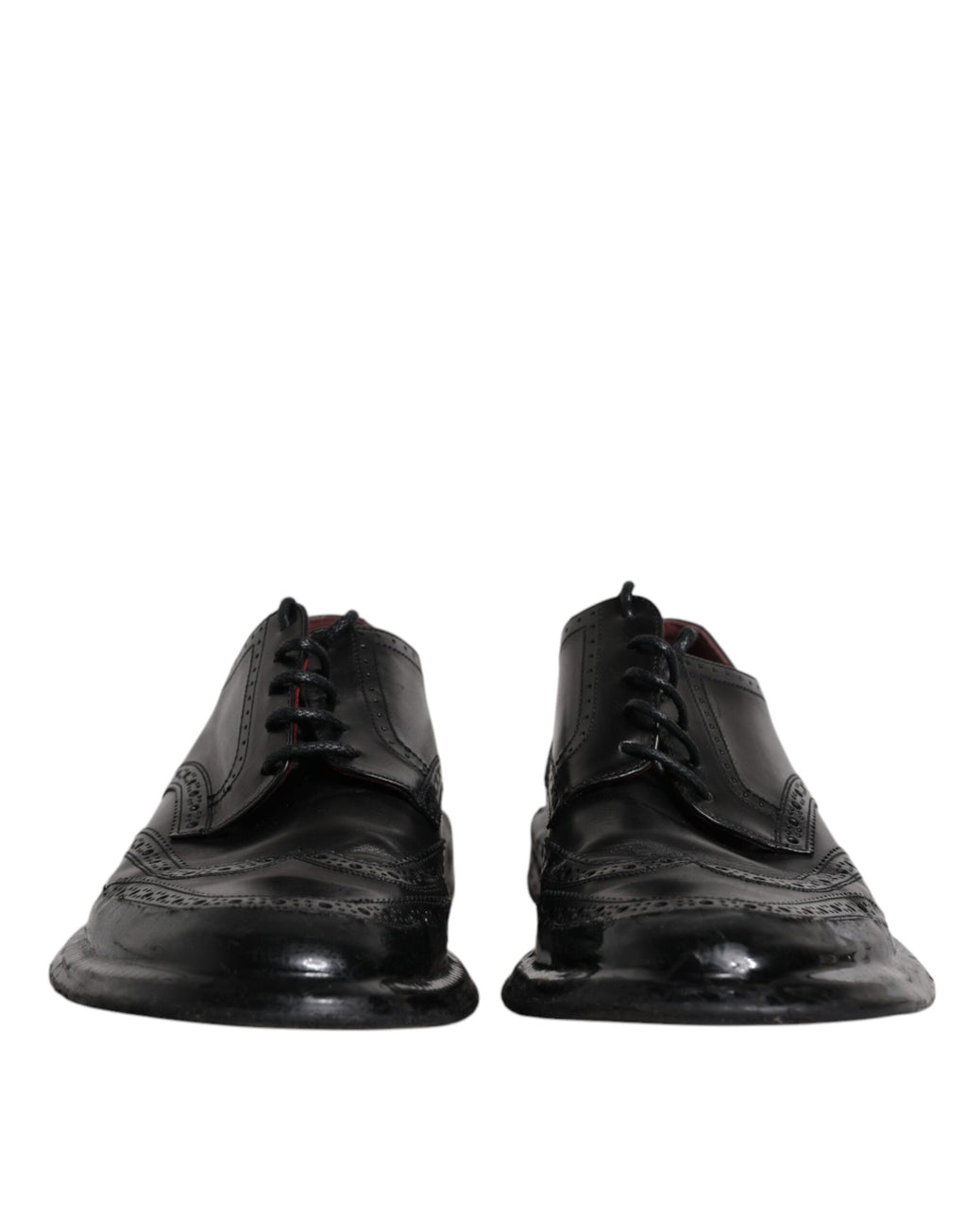 Chaussures derby en cuir noir Dolce & Gabbana, chaussures formelles avec détails wingtip, pour homme élégants et sophistiqués.