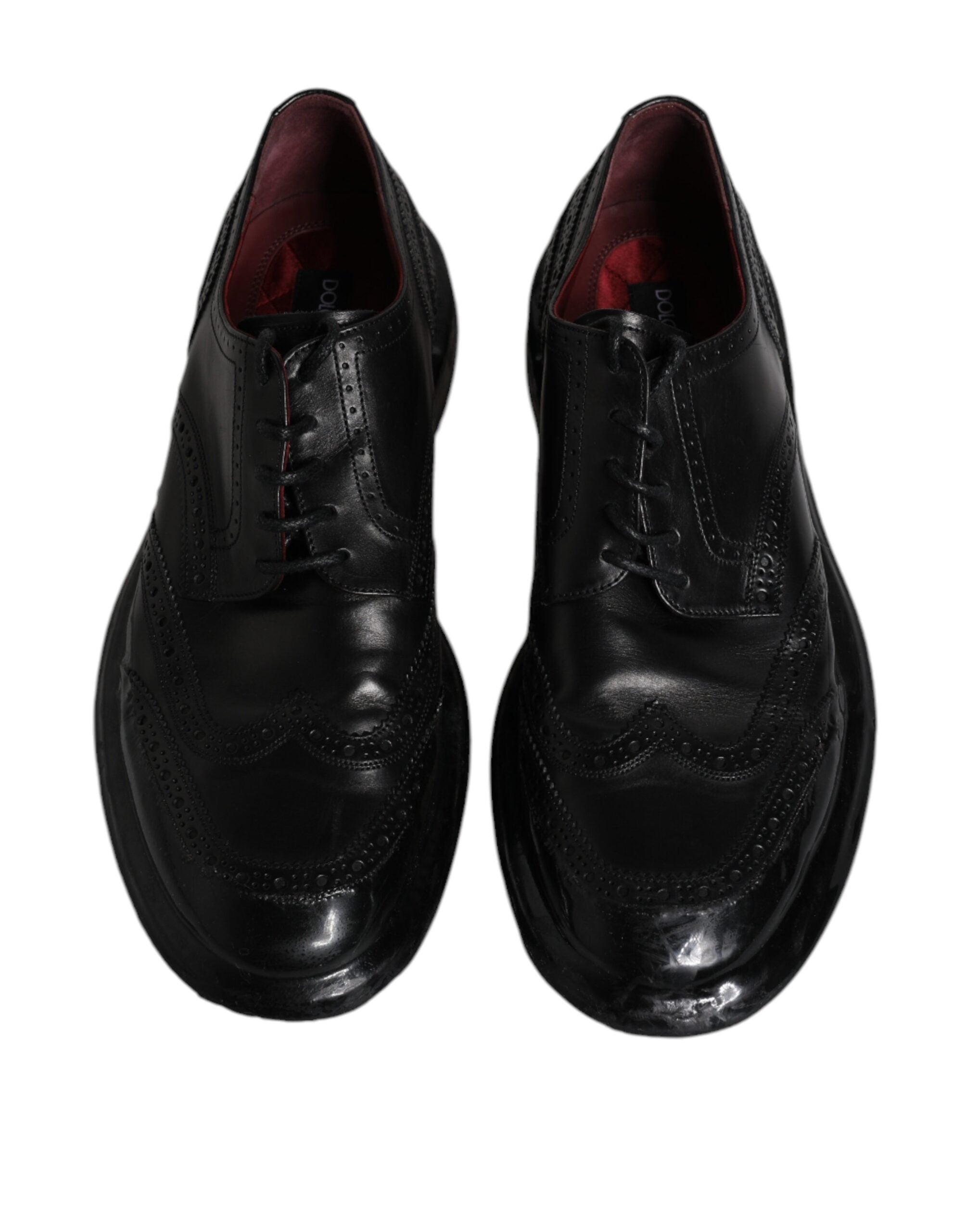 Chaussures derby en cuir noir Dolce & Gabbana, chaussures formelles avec détails wingtip et design élégant.