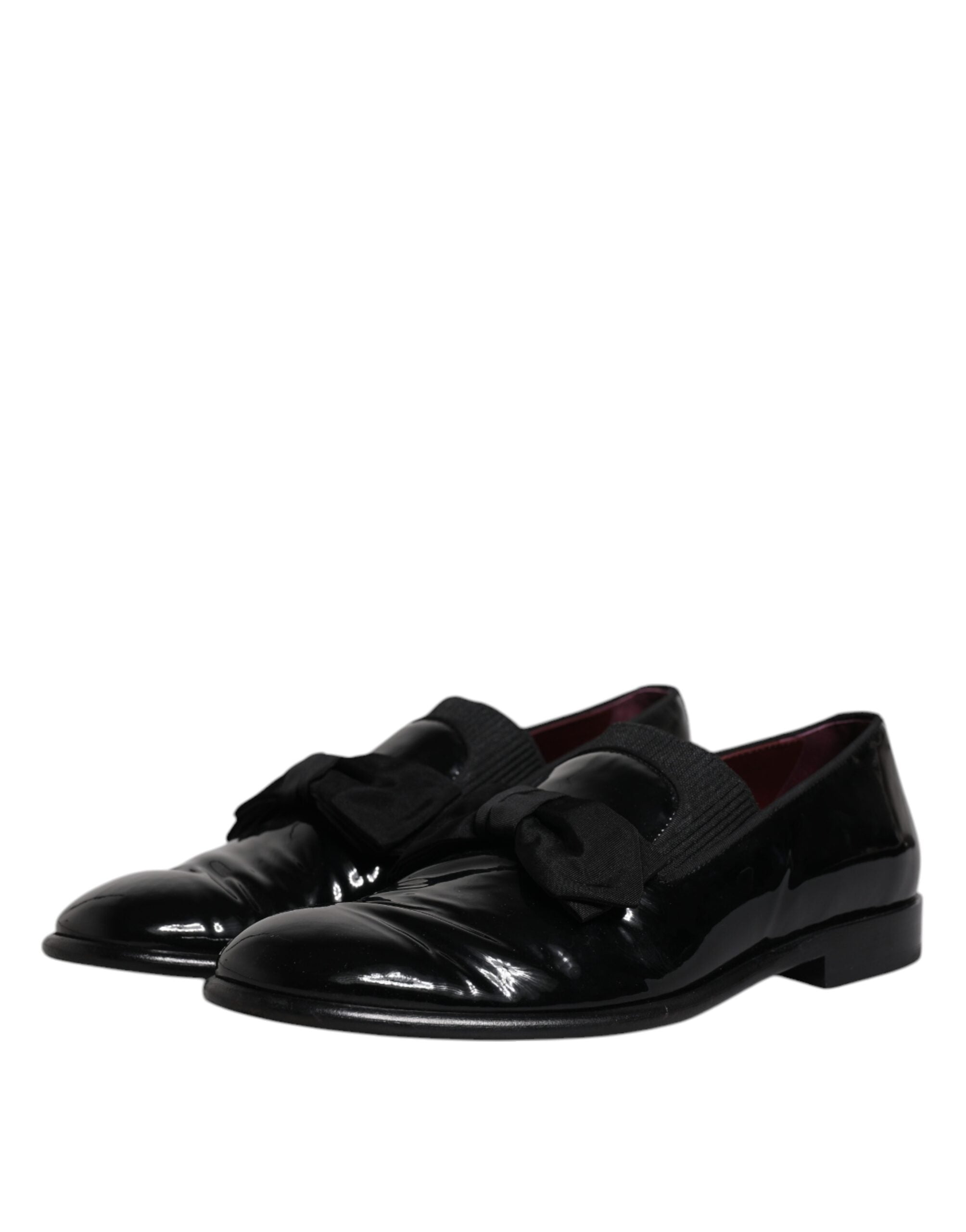 Chaussures hommes en cuir noir de luxe Dolce & Gabbana, mocassins formels élégants pour occasions spéciales.