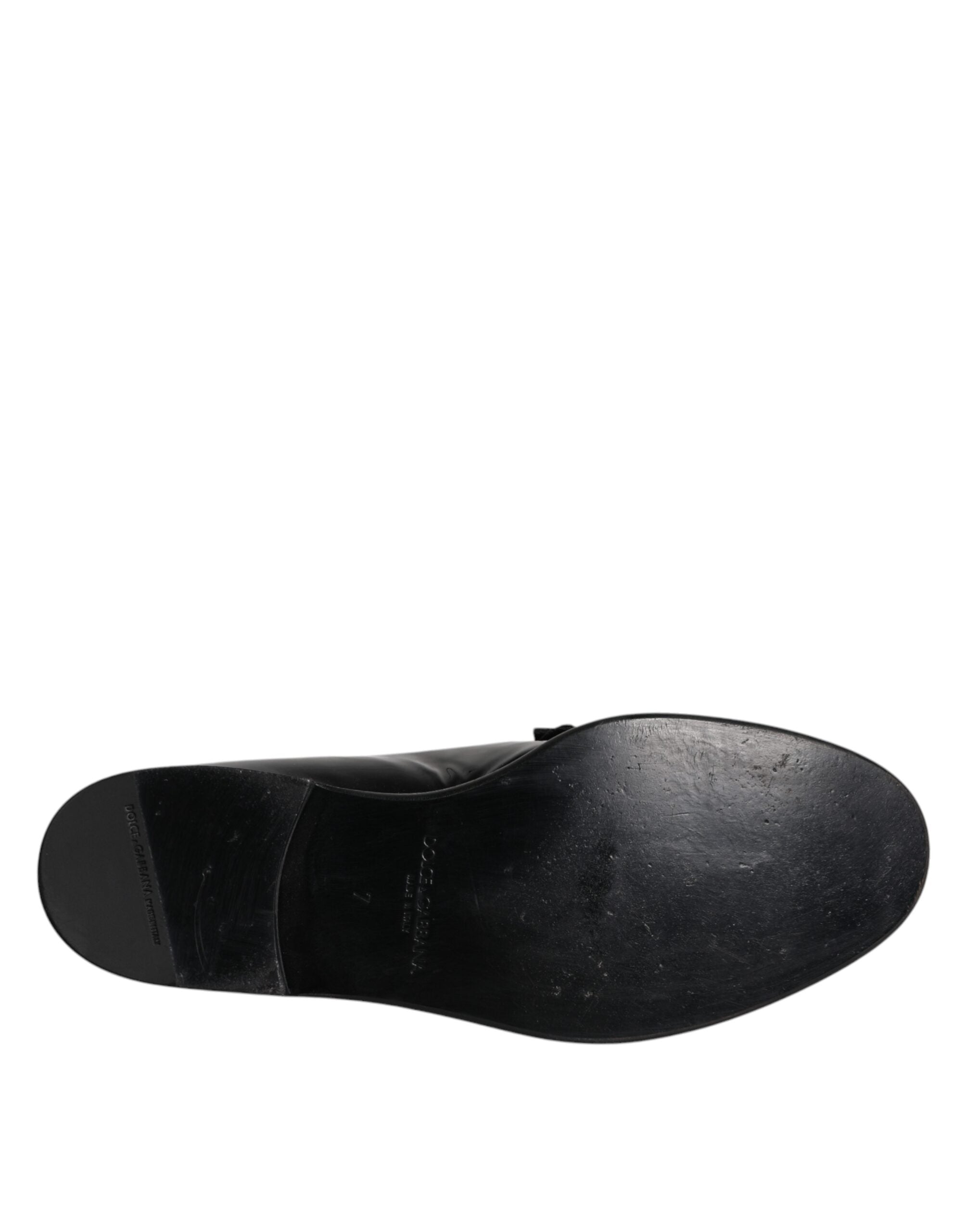 Chaussures Richelieu en cuir noir Dolce & Gabbana pour homme, chaussures formelles élégantes et sophistiquées.