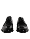 Chaussures Derby formelles en cuir verni noir de Dolce & Gabbana, élégantes et sophistiquées pour occasions spéciales.