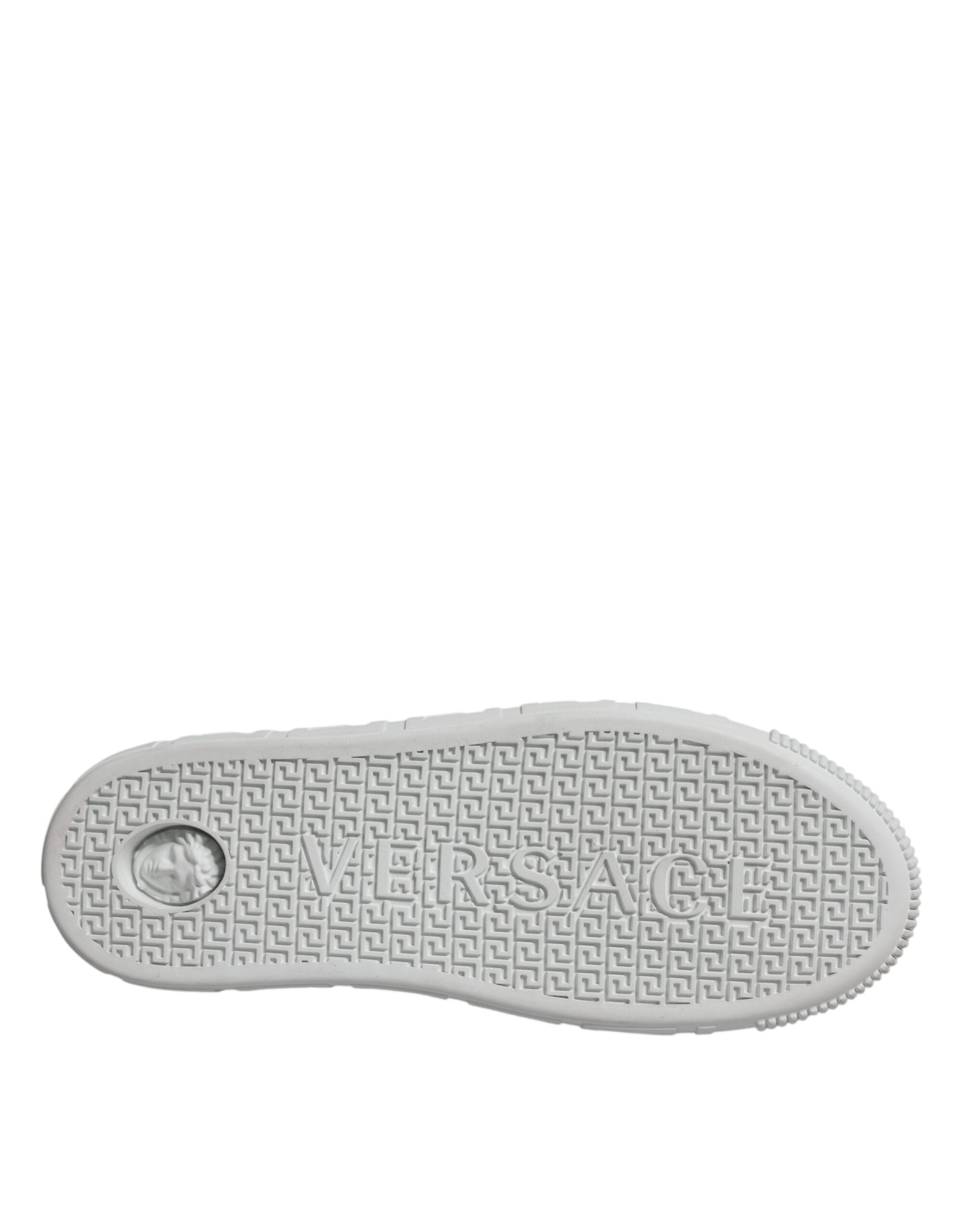 Chaussures sneakers basses Versace en blanc et rose avec motif Greca, plateforme élégante et design sophistiqué.