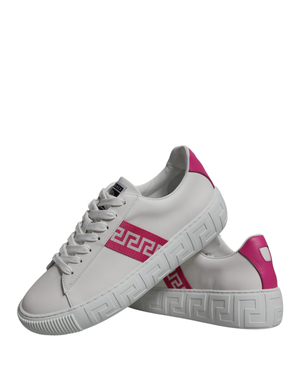 Chaussures sneakers platform basses Versace blanches et roses avec motif Greca, style élégant et moderne.