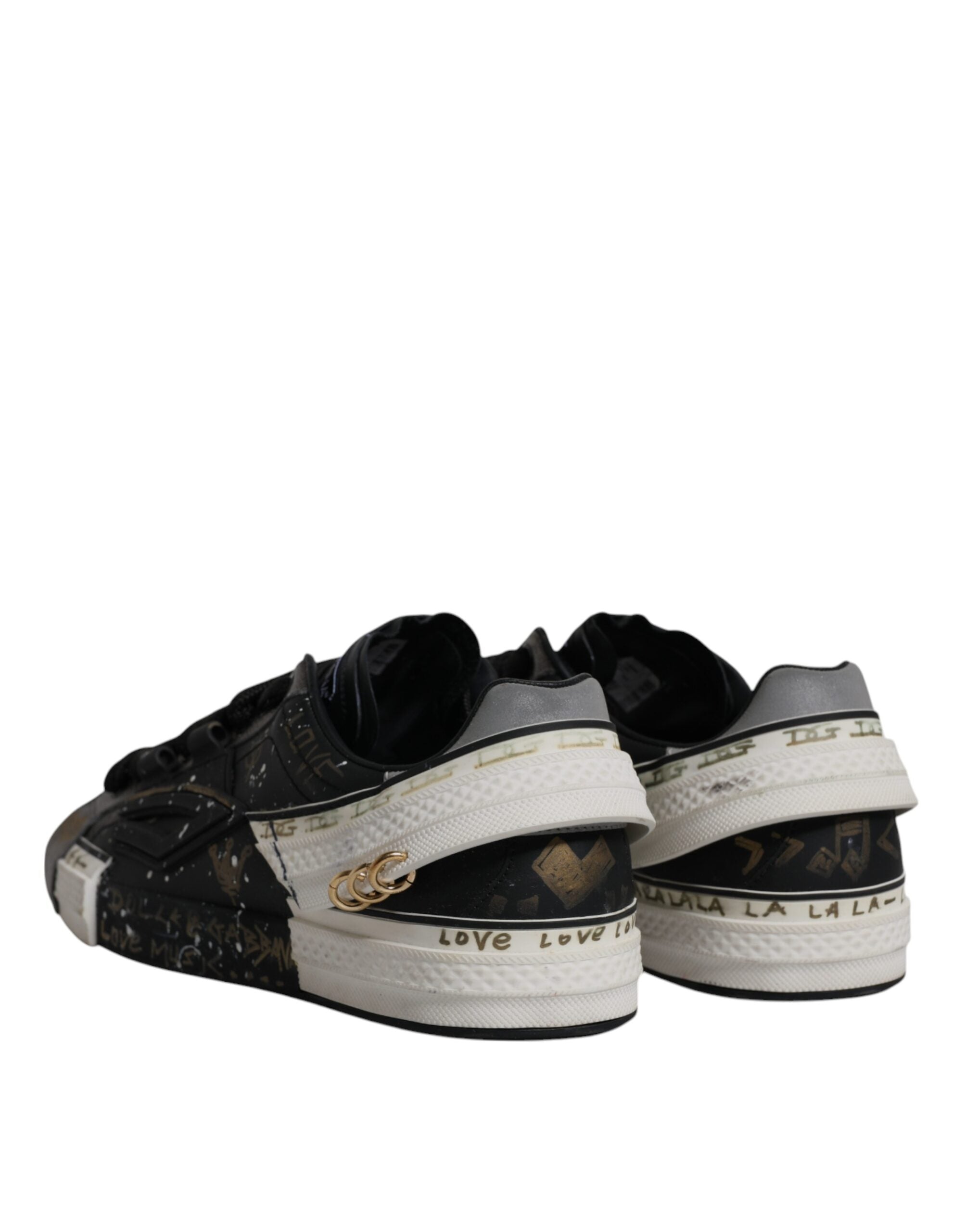 Chaussures basses Dolce & Gabbana Portofino en noir et blanc, baskets en toile avec semelles blanches.