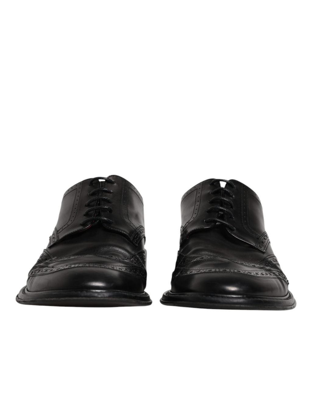 Chaussures derby en cuir noir Dolce & Gabbana, souliers formels à bout en wingtip avec détails élégants et finition sophistiquée.