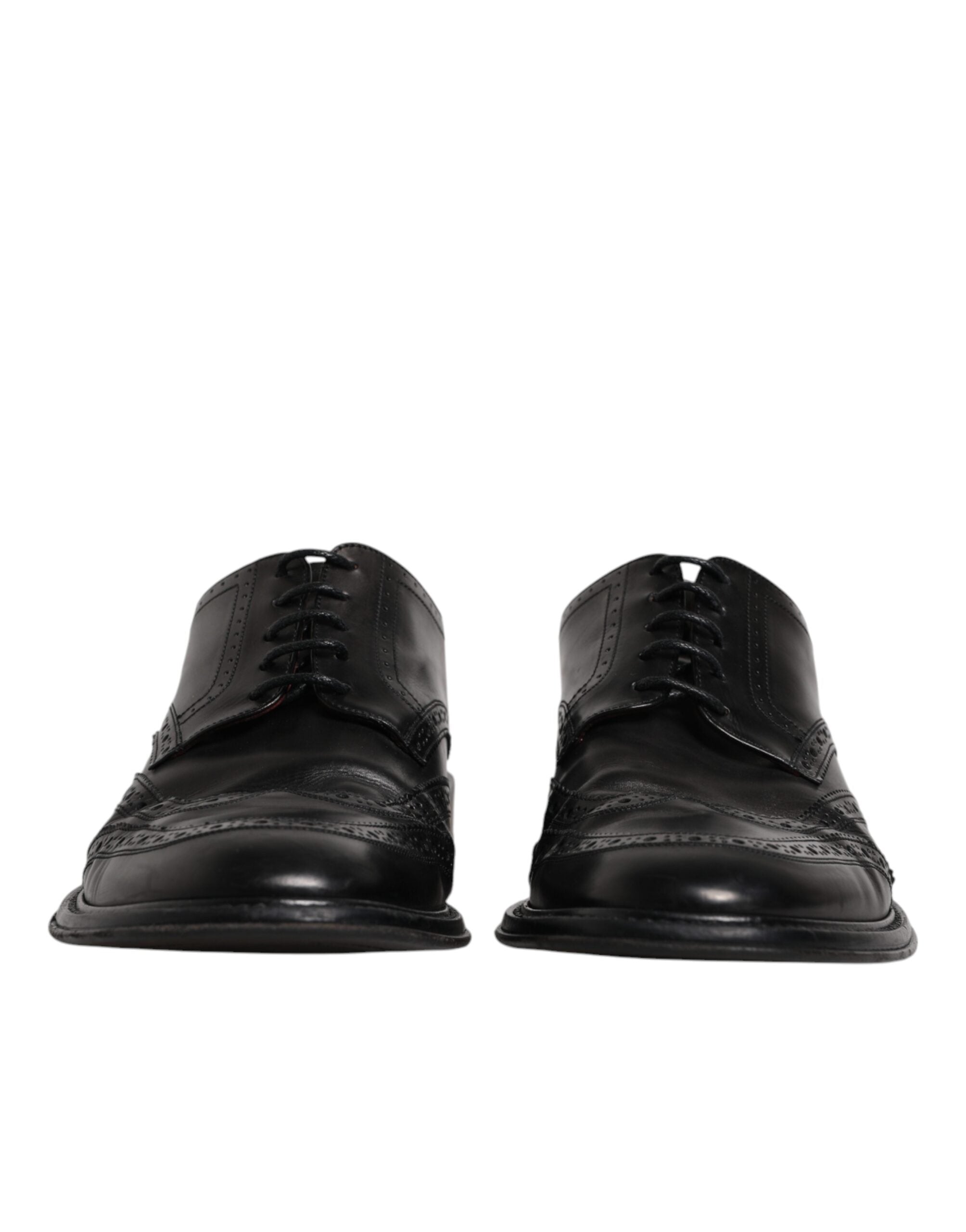 Chaussures derby en cuir noir Dolce & Gabbana, souliers formels à bout en wingtip avec détails élégants et finition sophistiquée.