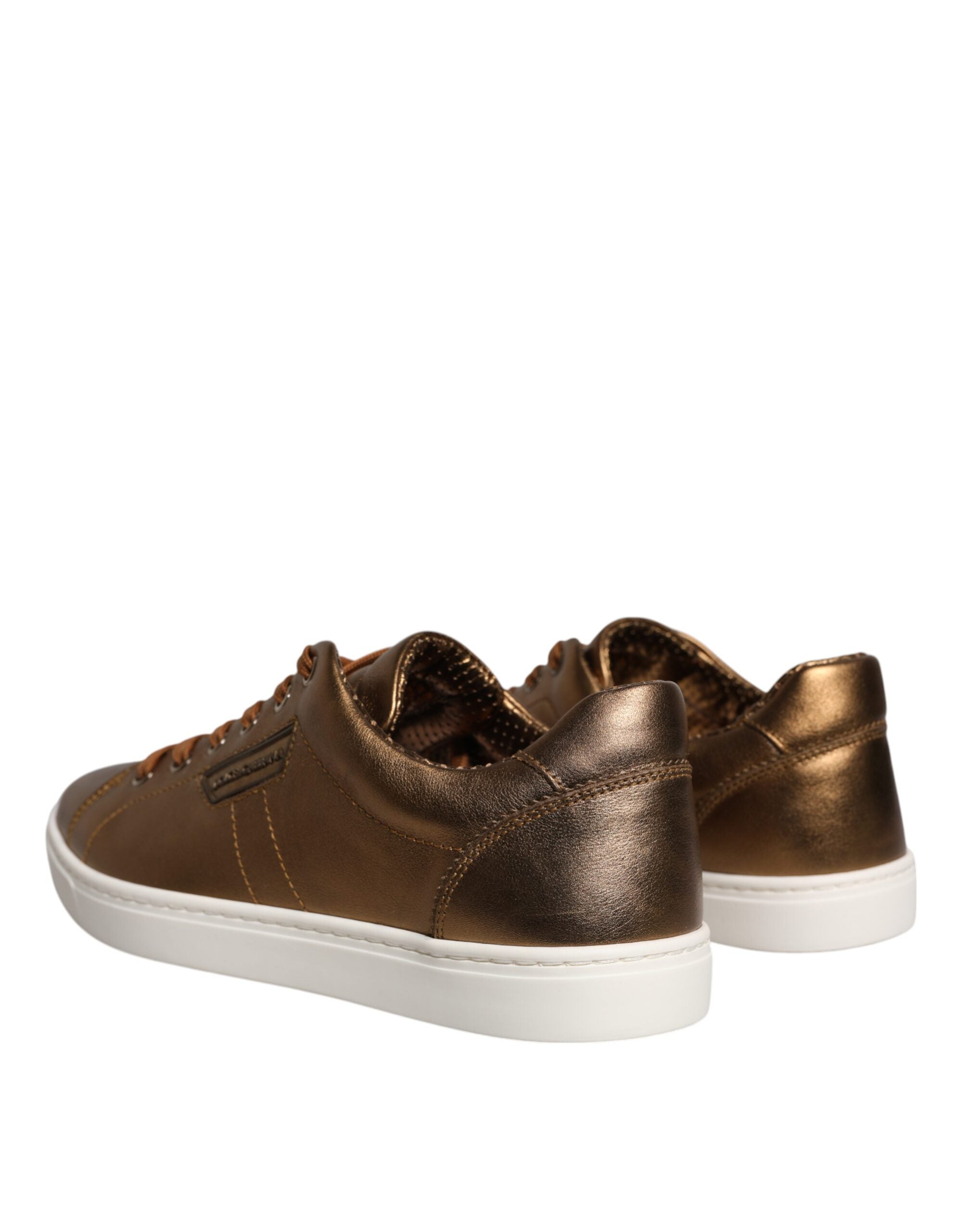 Chaussures de sport pour homme Dolce & Gabbana London en cuir doré avec logo, style élégant et moderne.