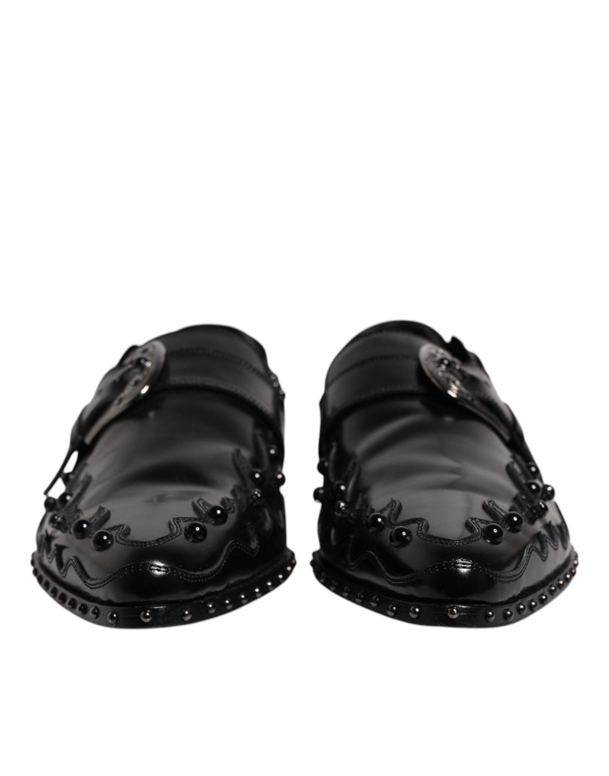 Chaussures Derby Monk strap noires Dolce & Gabbana ornées de embellissements élégants, en cuir sophistiqué.