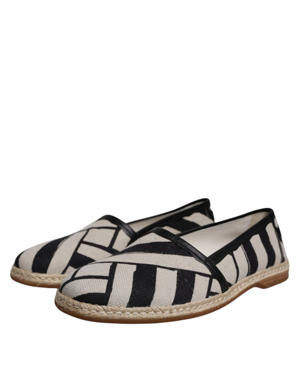 Chaussures espadrilles Dolce & Gabbana à rayures noires et blanches, slip-on, élégantes et confortables pour l'été.