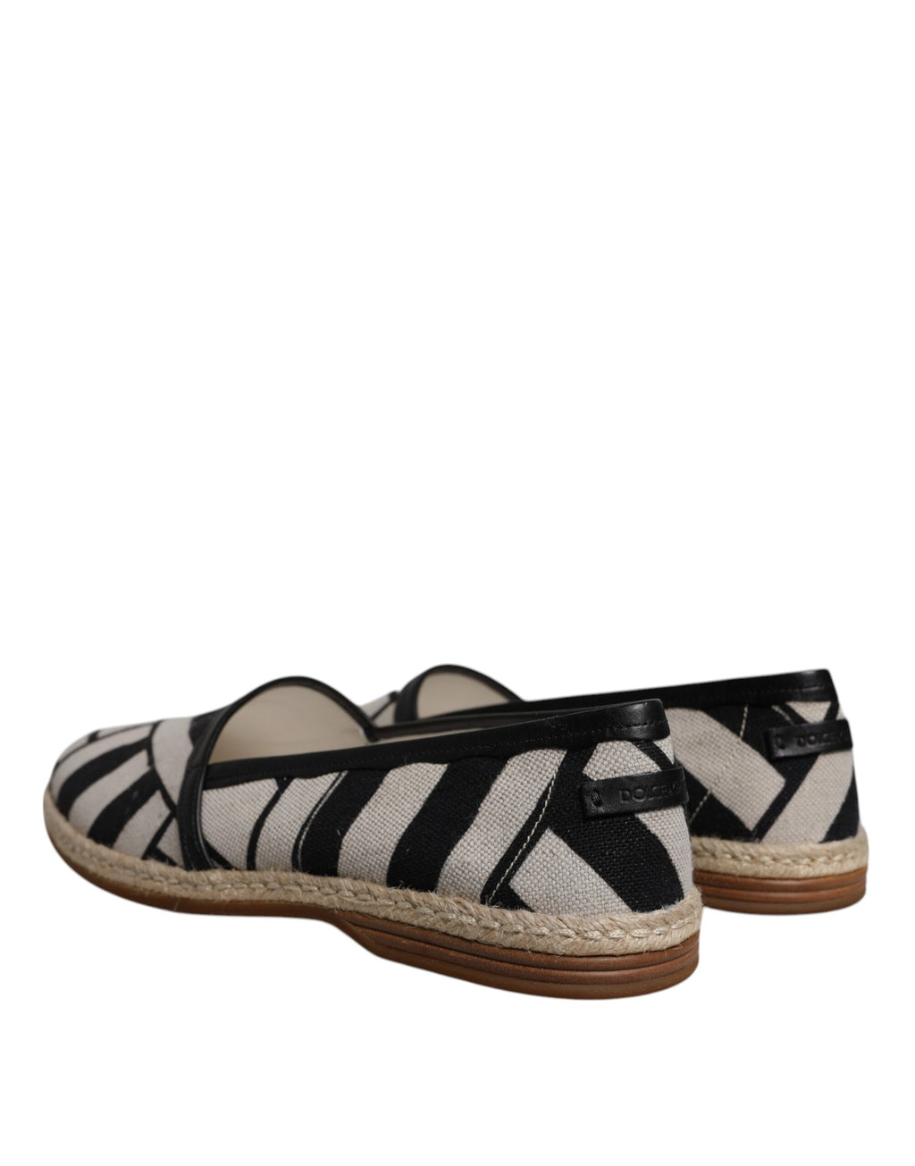 Chaussures slip-on espadrilles Dolce & Gabbana à rayures noires et blanches, confortables et élégantes pour l'été.