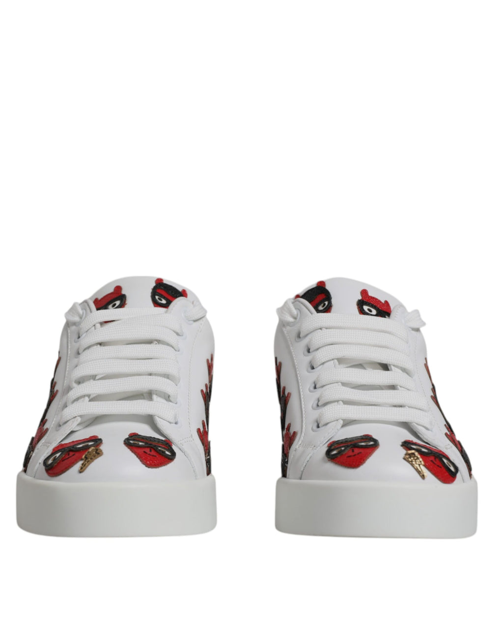 Chaussures portofino blanches Dolce & Gabbana avec visage de diable sur le devant, sneakers tendance et élégants.