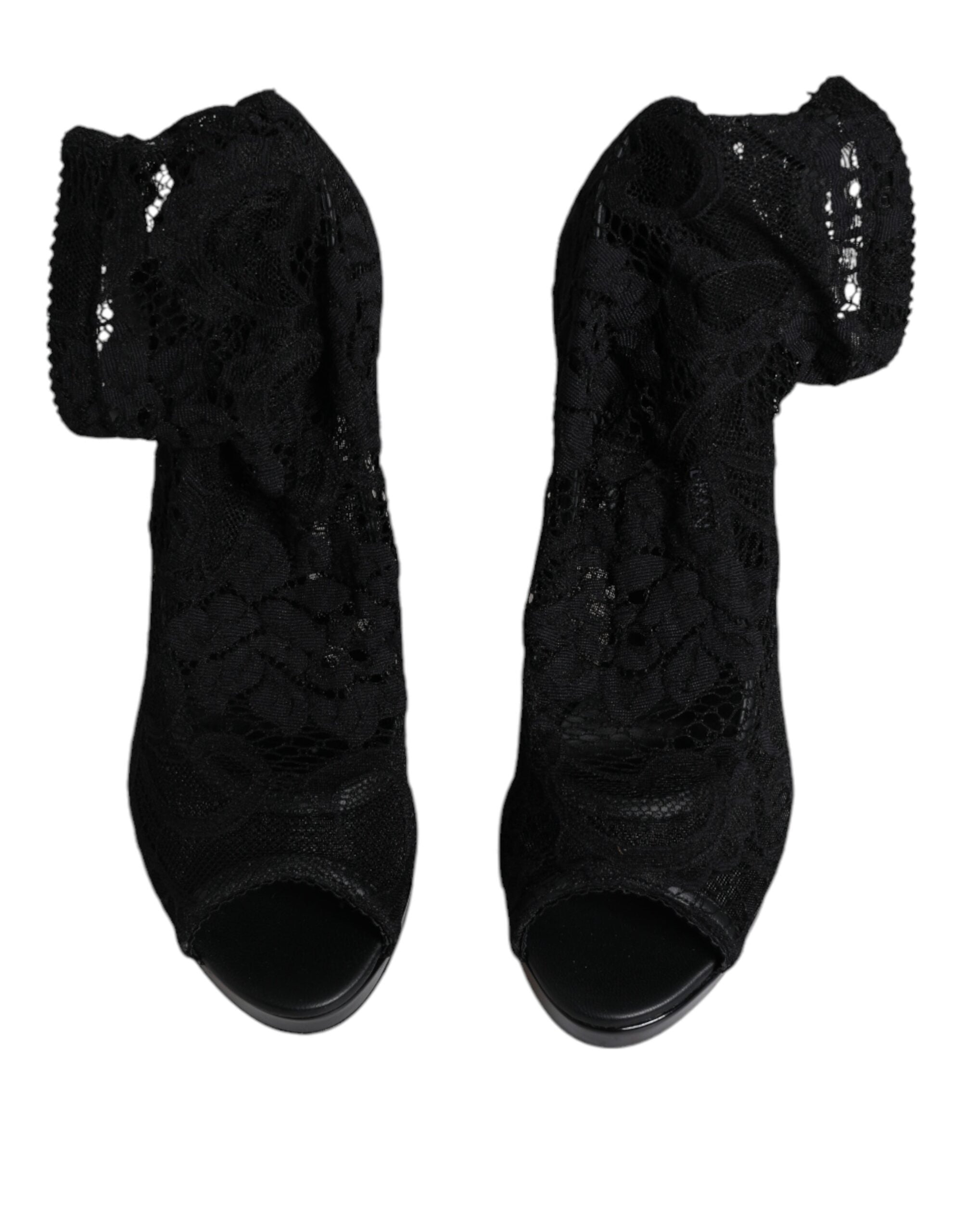 Bottes noires Dolce & Gabbana Taormina en dentelle extensible, élégantes et sophistiquées, vues de face sur fond neutre.