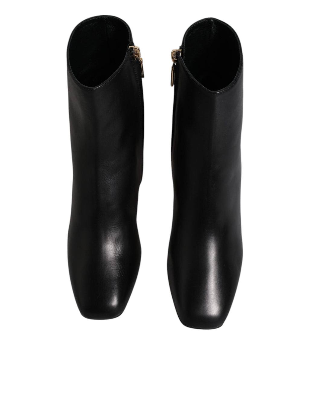 Bottes en cuir noir Dolce & Gabbana Jackie mi-mollet, chaussures élégantes avec finition soignée et design sophistiqué.