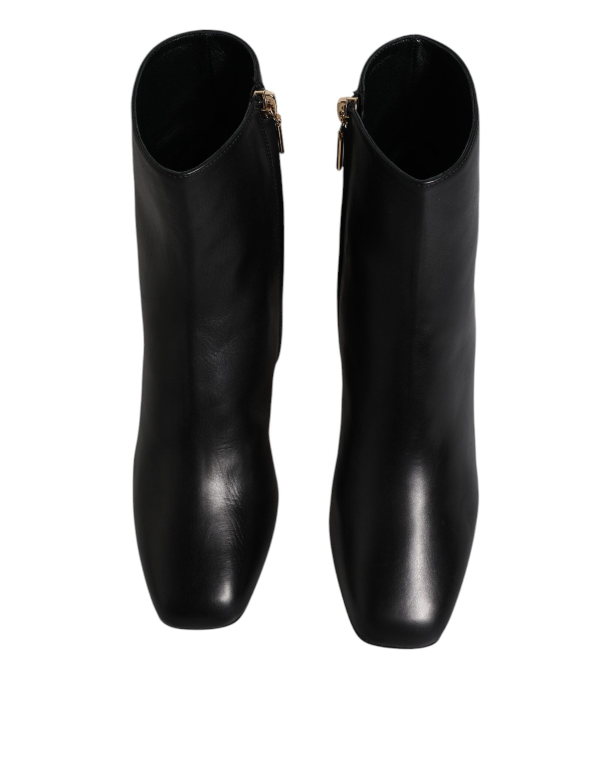 Bottes en cuir noir Dolce & Gabbana Jackie mi-mollet, chaussures élégantes avec finition soignée et design sophistiqué.