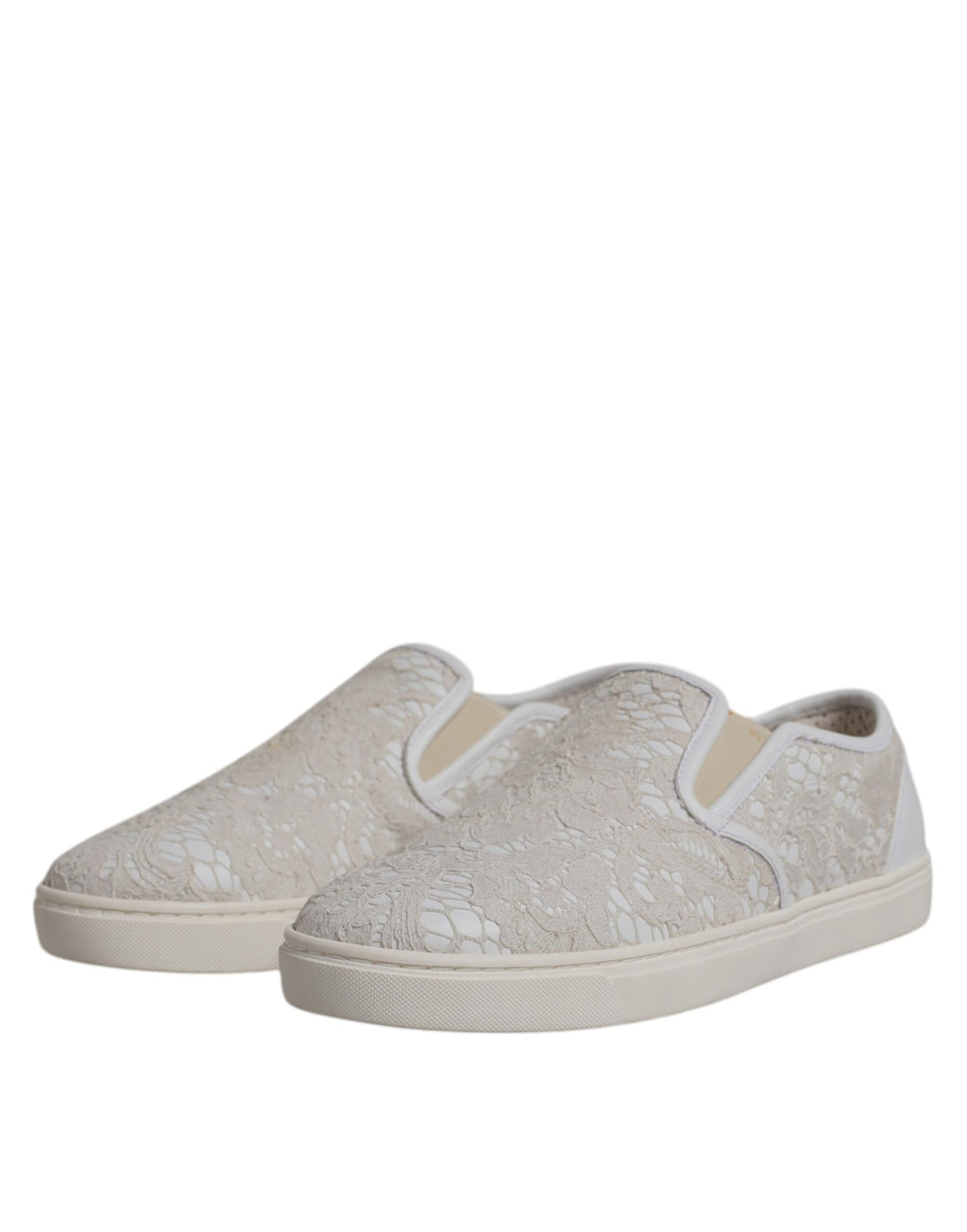 Chaussures Dolce & Gabbana en dentelle blanche avec motif floral, mocassins slip-on élégants pour femmes.
