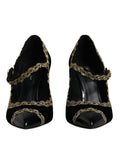 Chaussures Dolce & Gabbana Mary Janes en velours noir avec détails dorés, élégantes et raffinées.