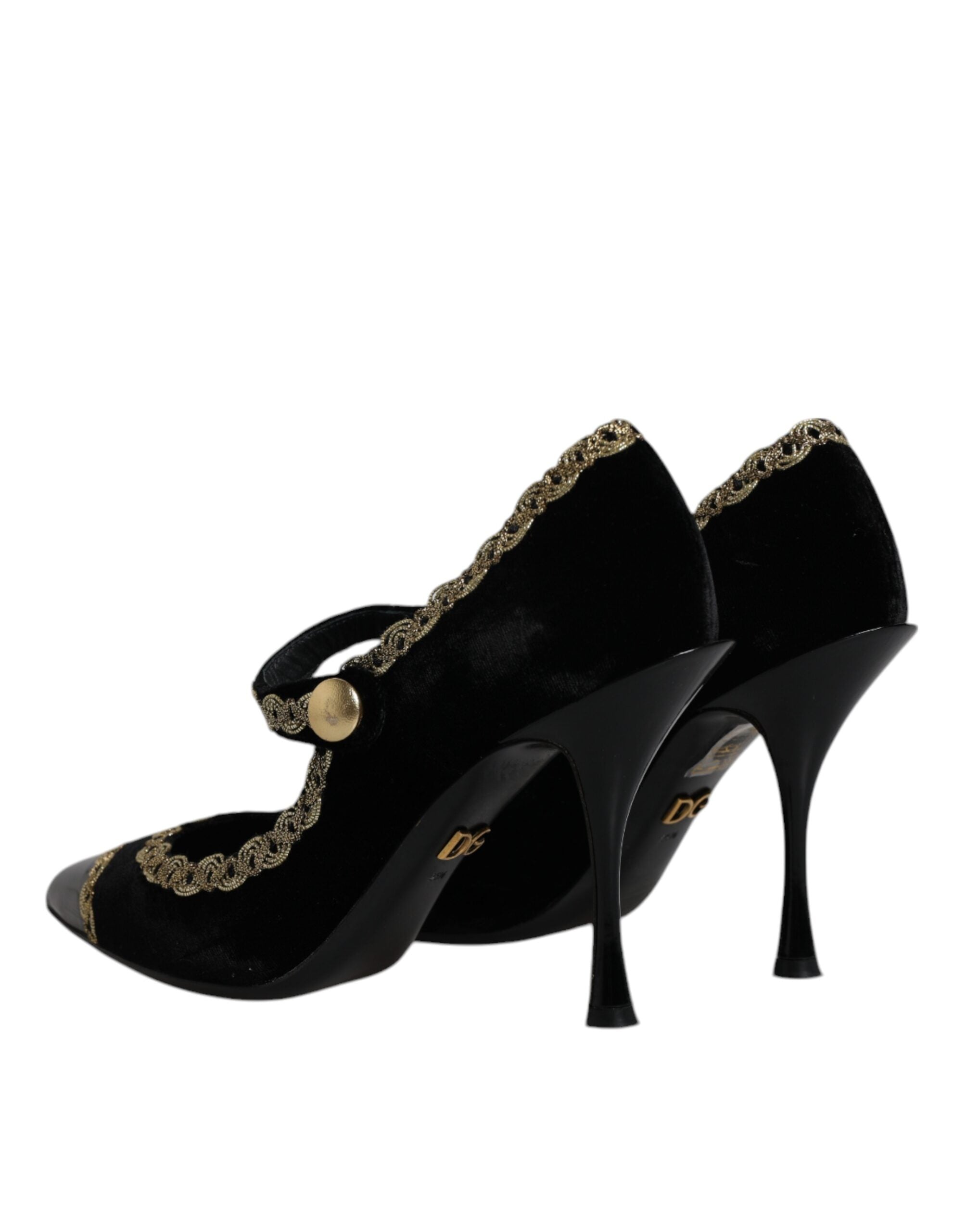 Chaussures Dolce & Gabbana Mary Janes en velours noir avec détails dorés, talons élégants et bride à la cheville.