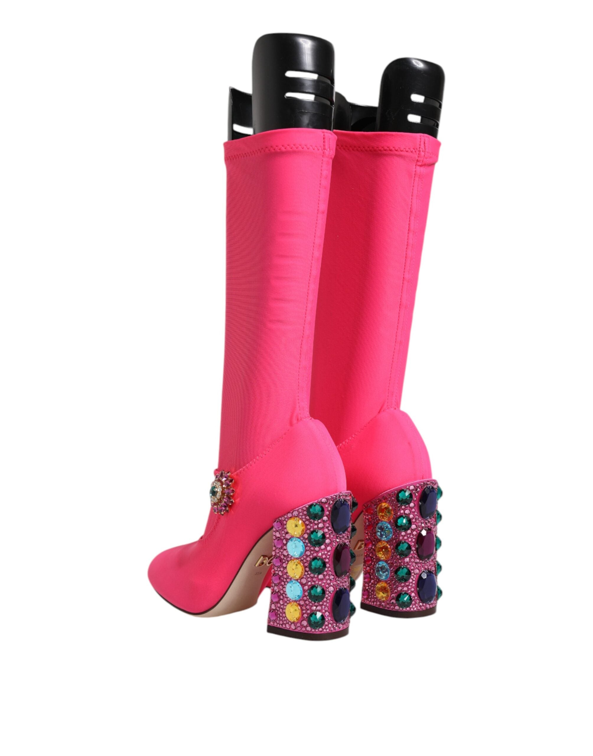 Bottes hautes en nylon rose Dolce & Gabbana avec cristaux, style élégant et moderne, visibles sur la photo.