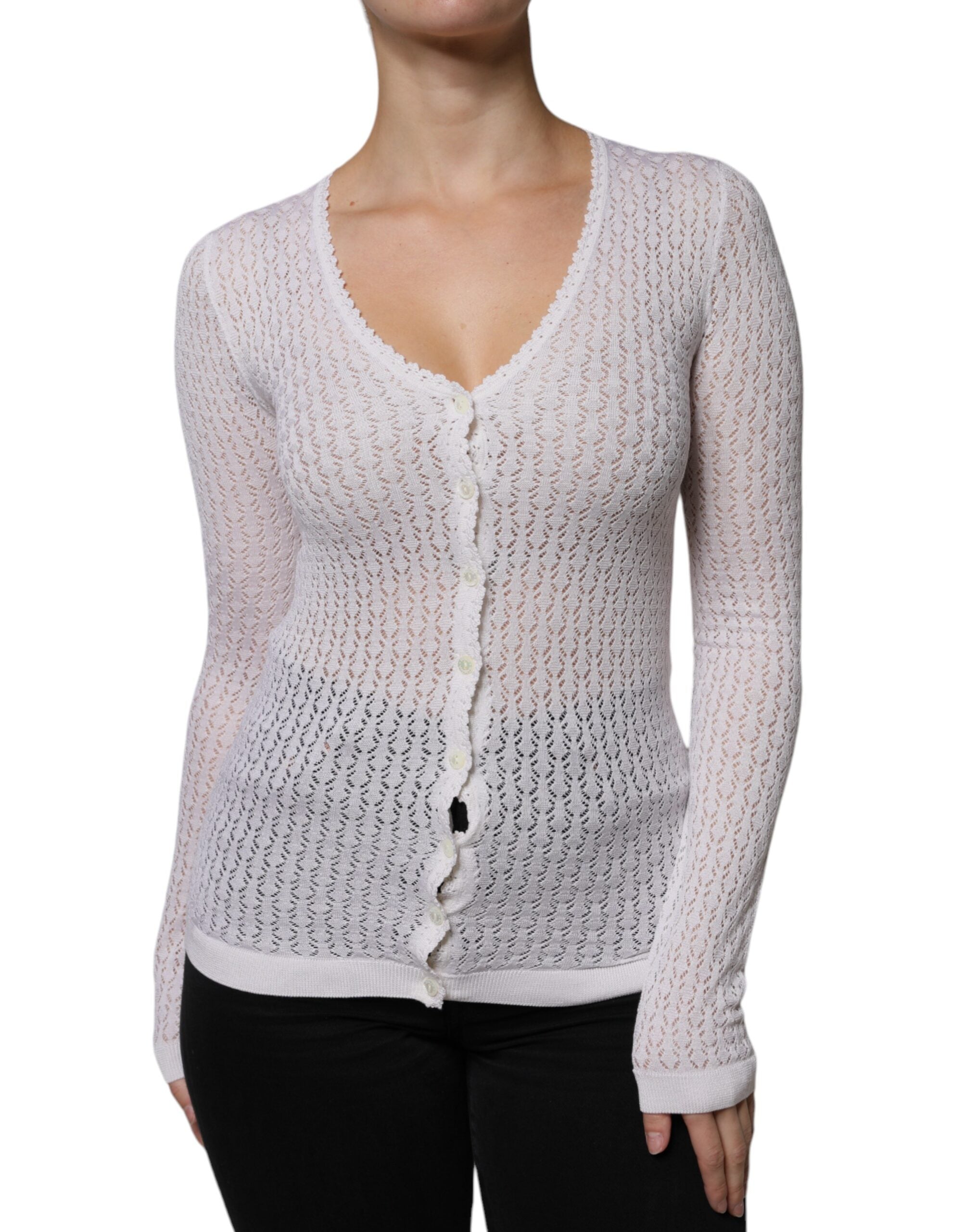 Cardigan Dolce & Gabbana en soie blanche à boutons, vue de face, avec col classique et manches longues.