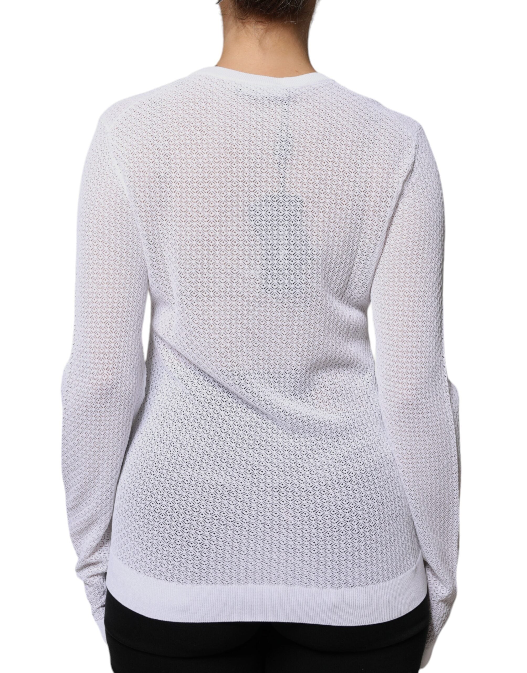Haut en maille blanche Dolce & Gabbana à manches longues transparentes, style élégant et sophistiqué.