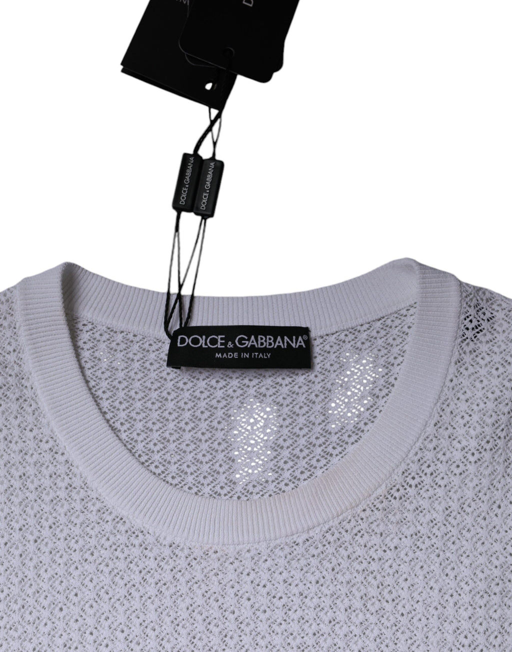 Haut en maille blanche à manches longues transparentes de Dolce & Gabbana, élégant et léger, adapté pour un style sophistiqué.