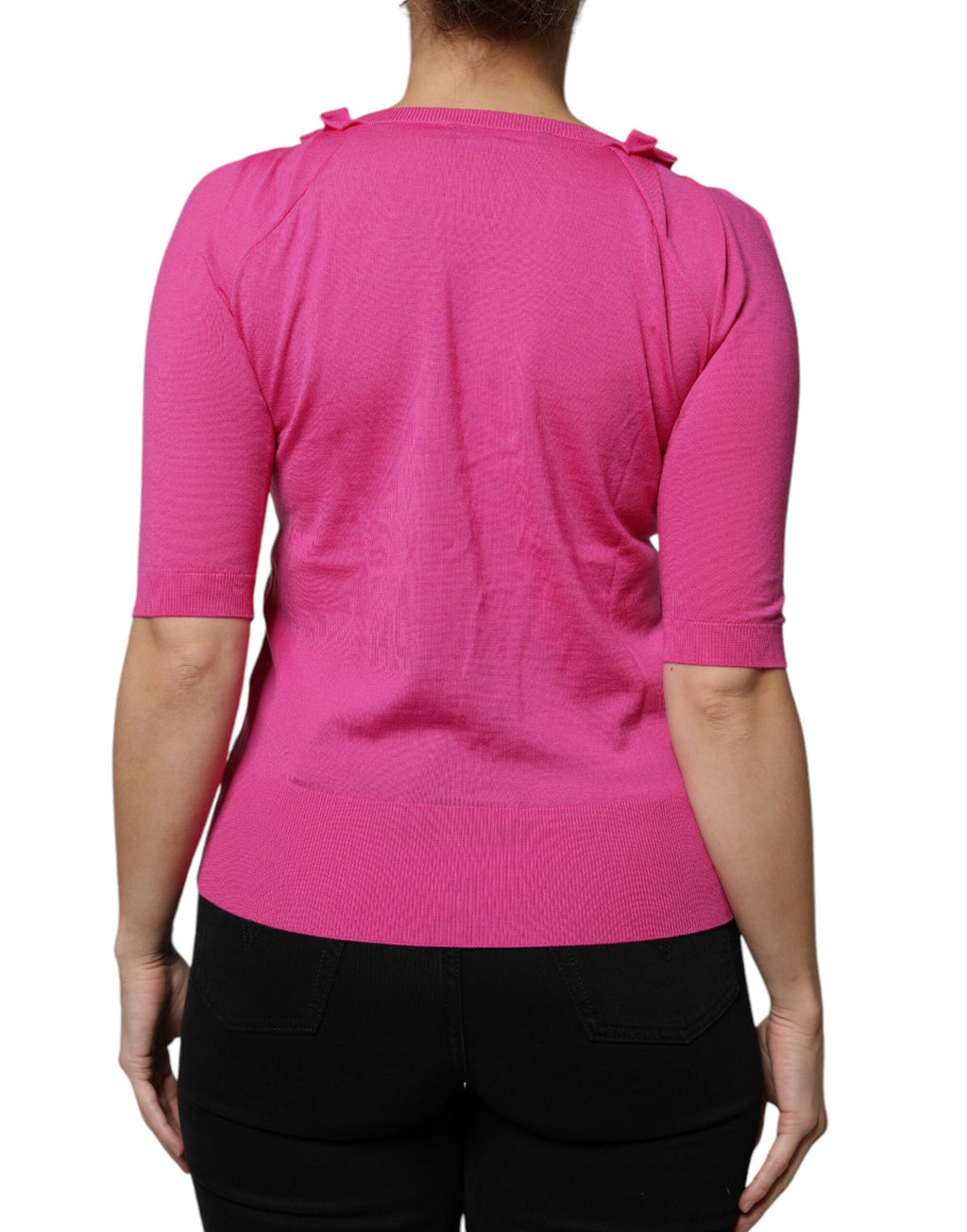 Cardigan en laine rose Dolce & Gabbana avec boutons, style élégant et confortable pour femme.