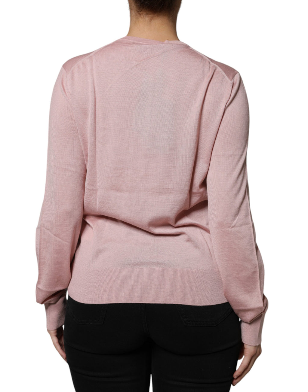 Cardigan en laine rose Dolce & Gabbana avec boutons, pull-over élégant, détail tricot chaud et mode pour femme.