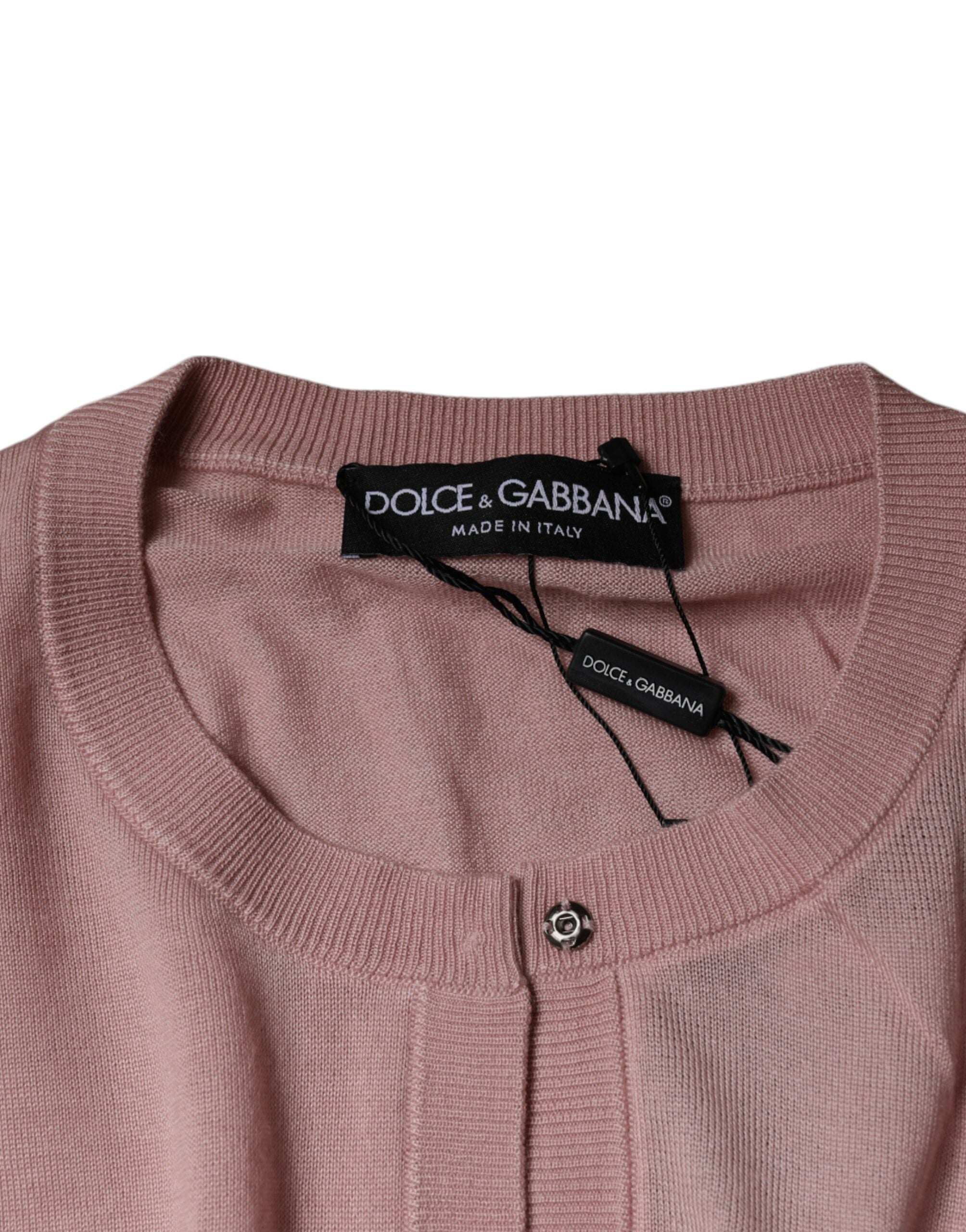 Pull en laine rose Dolce & Gabbana avec boutons, cardigan élégant et confortable pour un look chic et décontracté.