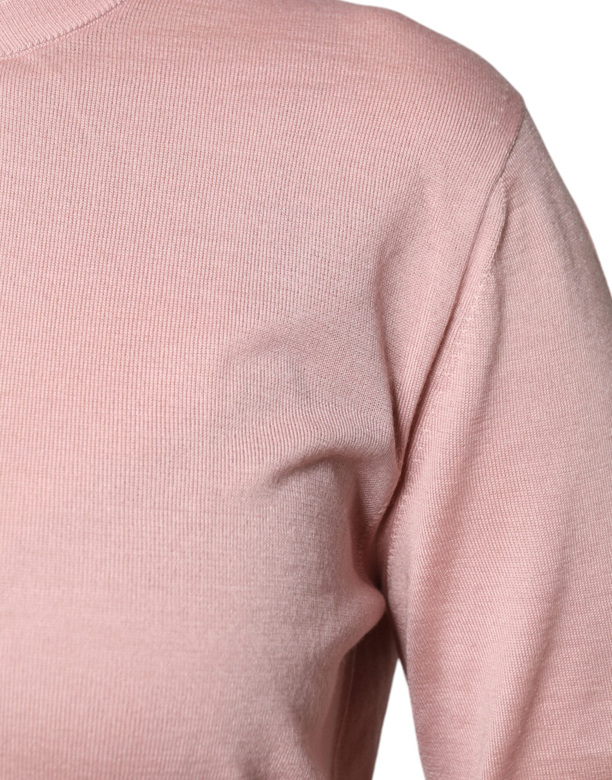 Cardigan en laine rose Dolce & Gabbana avec boutons, pull-over chic et confortable pour femme.