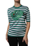 T-shirt à col rond Dolce & Gabbana blanc avec rayures vertes et motif de feuilles, design élégant et moderne.