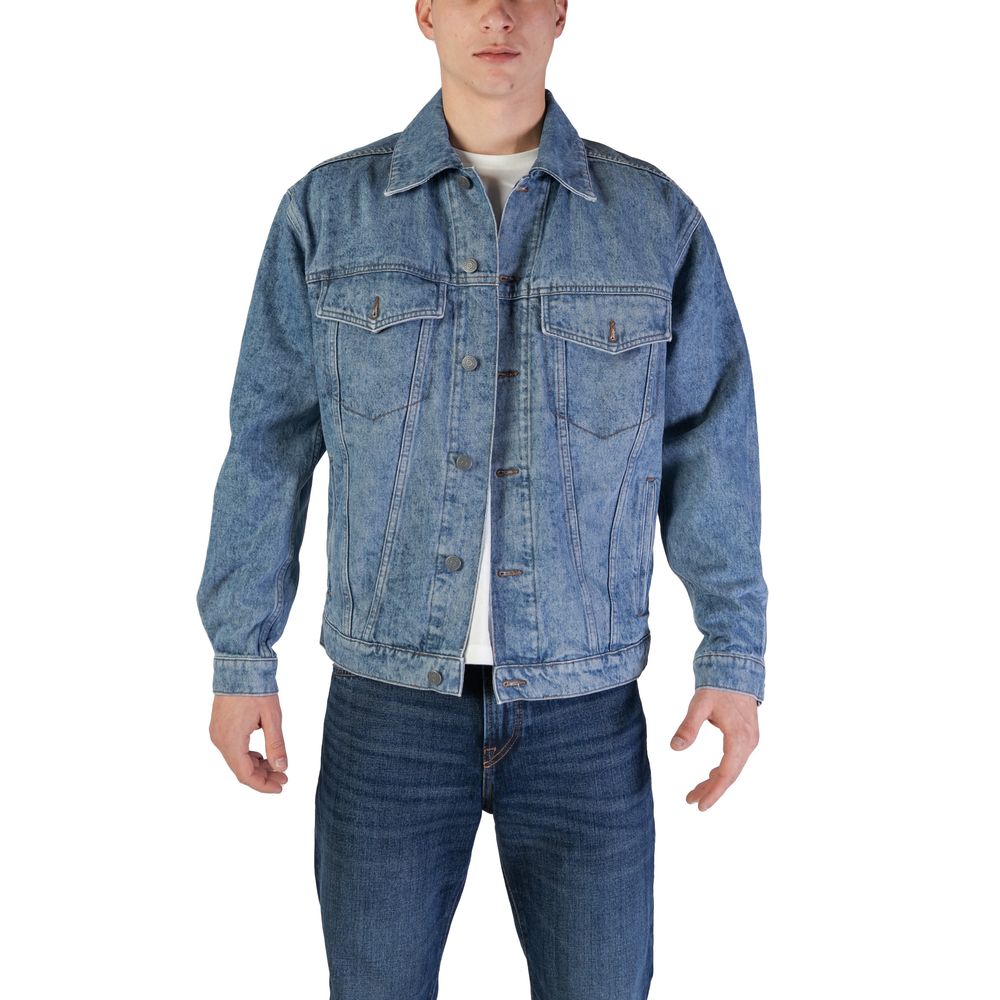 Veste en denim en coton bleu clair de la marque Hugo Boss, style décontracté et moderne.