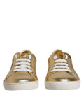 Chaussures sneakers pour homme Dolce & Gabbana en cuir doré avec logo London, style moderne et élégance sophistiquée.