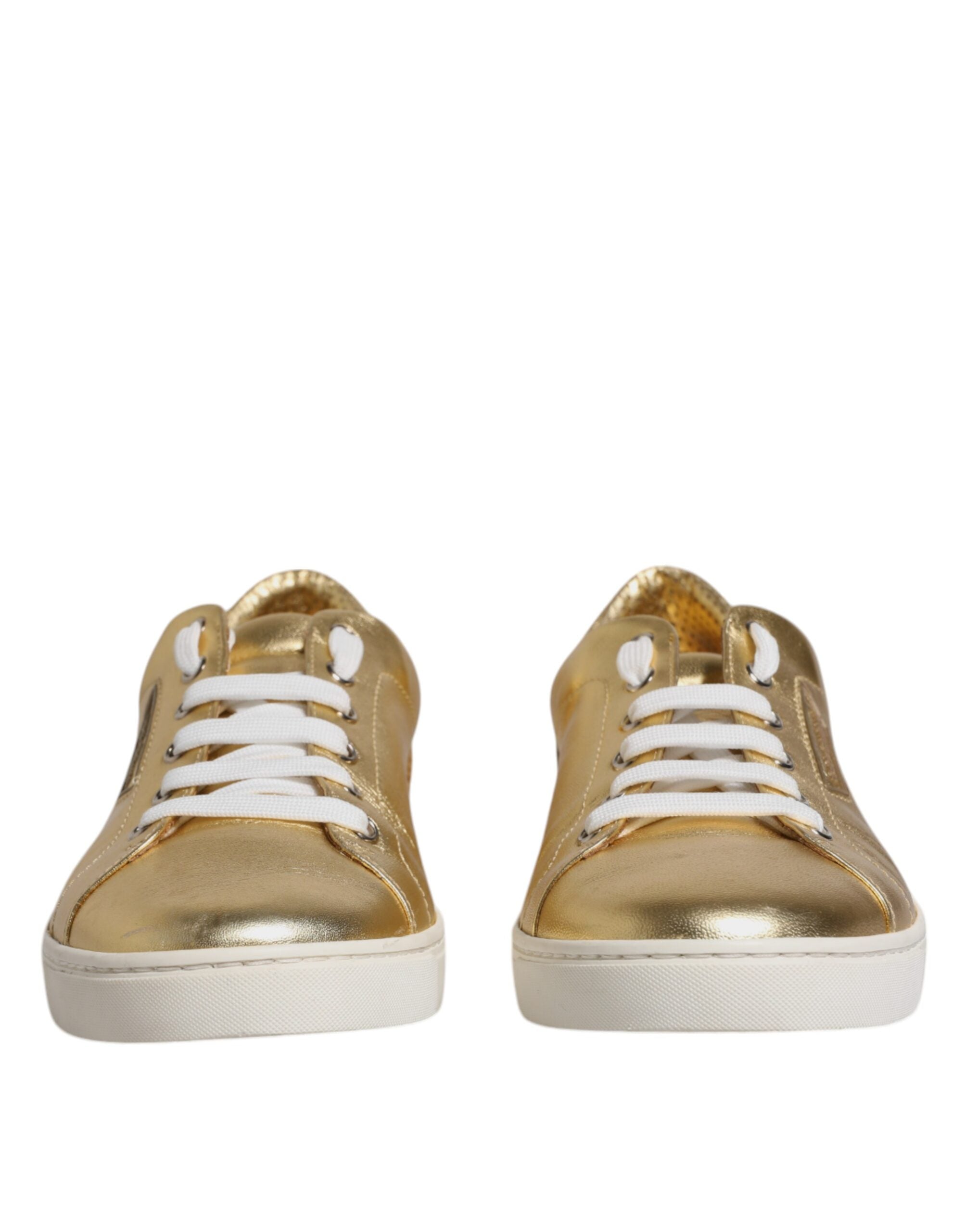 Chaussures sneakers pour homme Dolce & Gabbana en cuir doré avec logo London, style moderne et élégance sophistiquée.