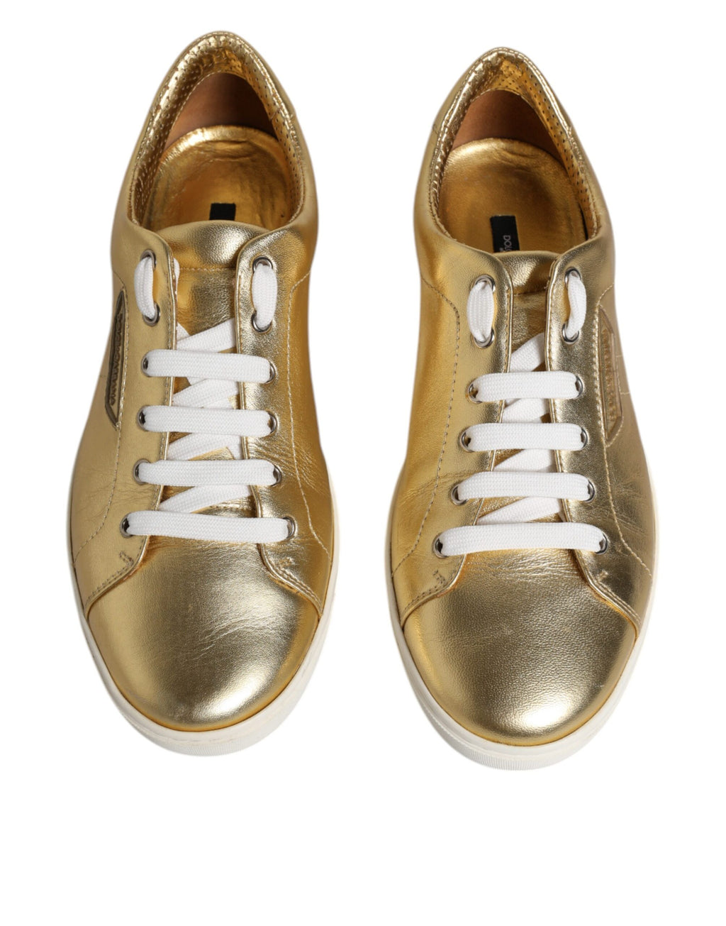 Chaussures sneakers pour hommes Dolce & Gabbana en cuir doré avec logo London, visibles sur l'image.